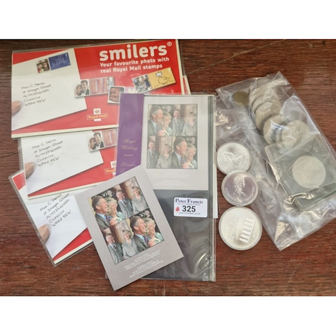 Box of stamps and coins to include: Royal Mail Mint Stamps f...