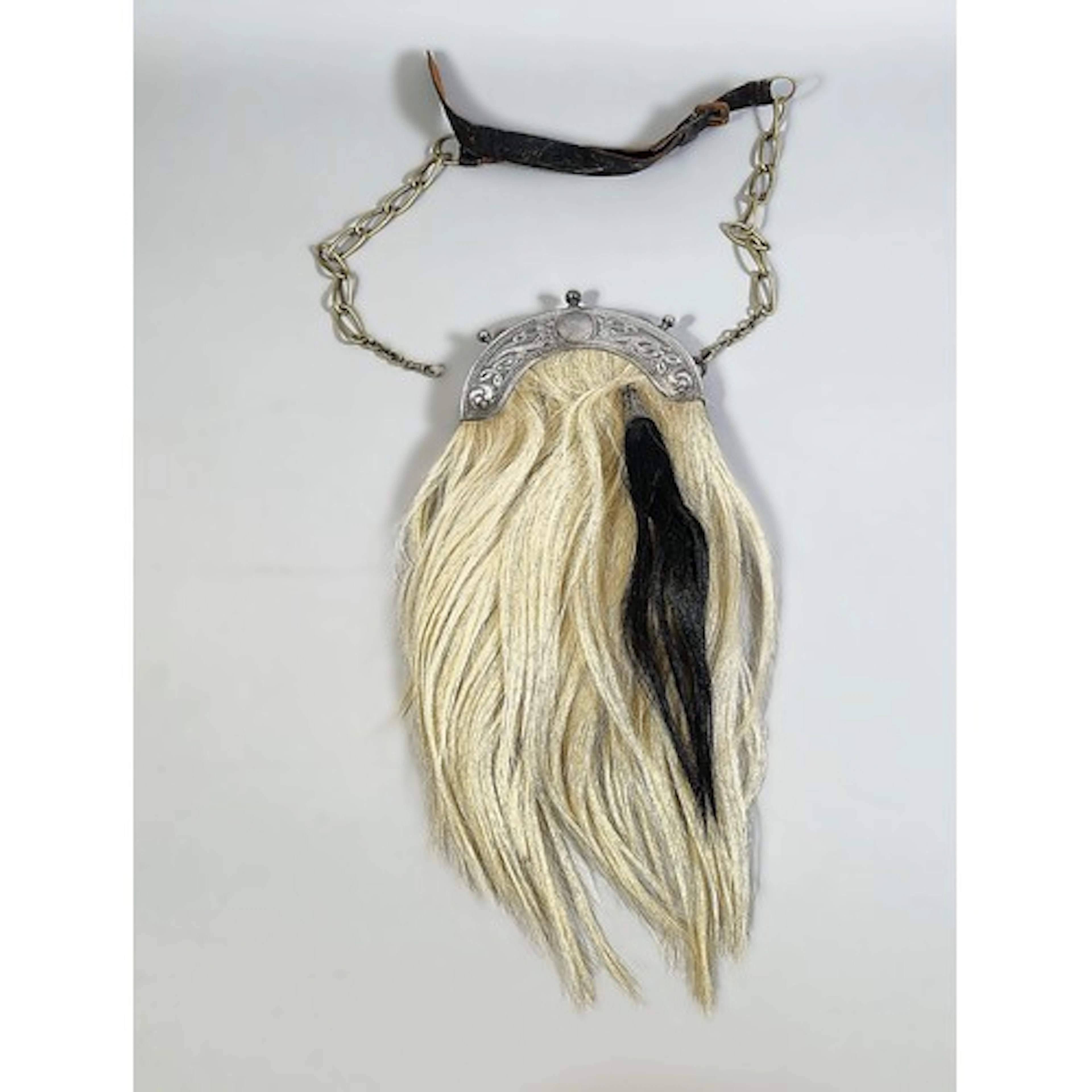 Scottish antique dress sporran with ornate white metal serpe...