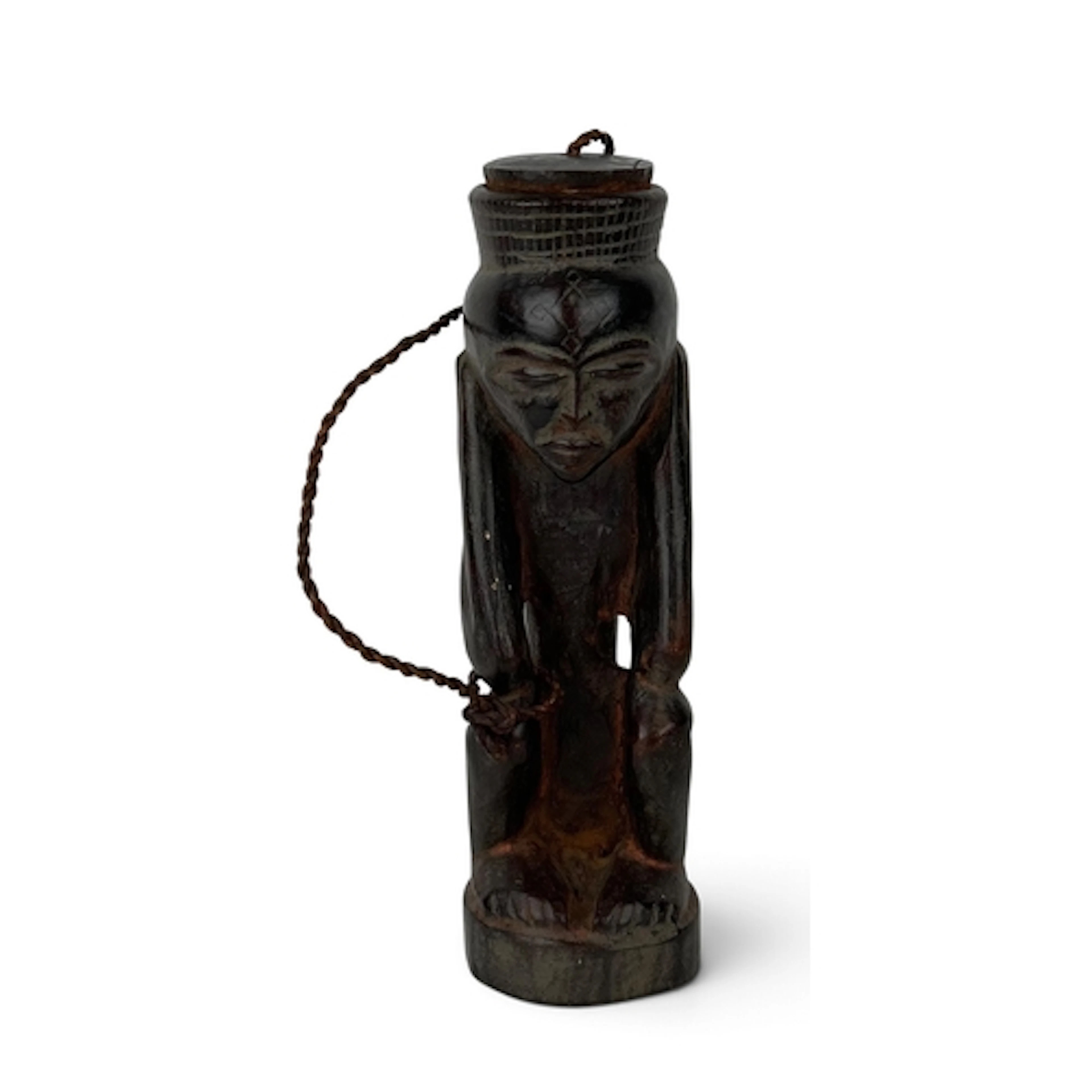 AN AFRICAN TRIBAL VESSEL WITH LID In the form of a crouching...