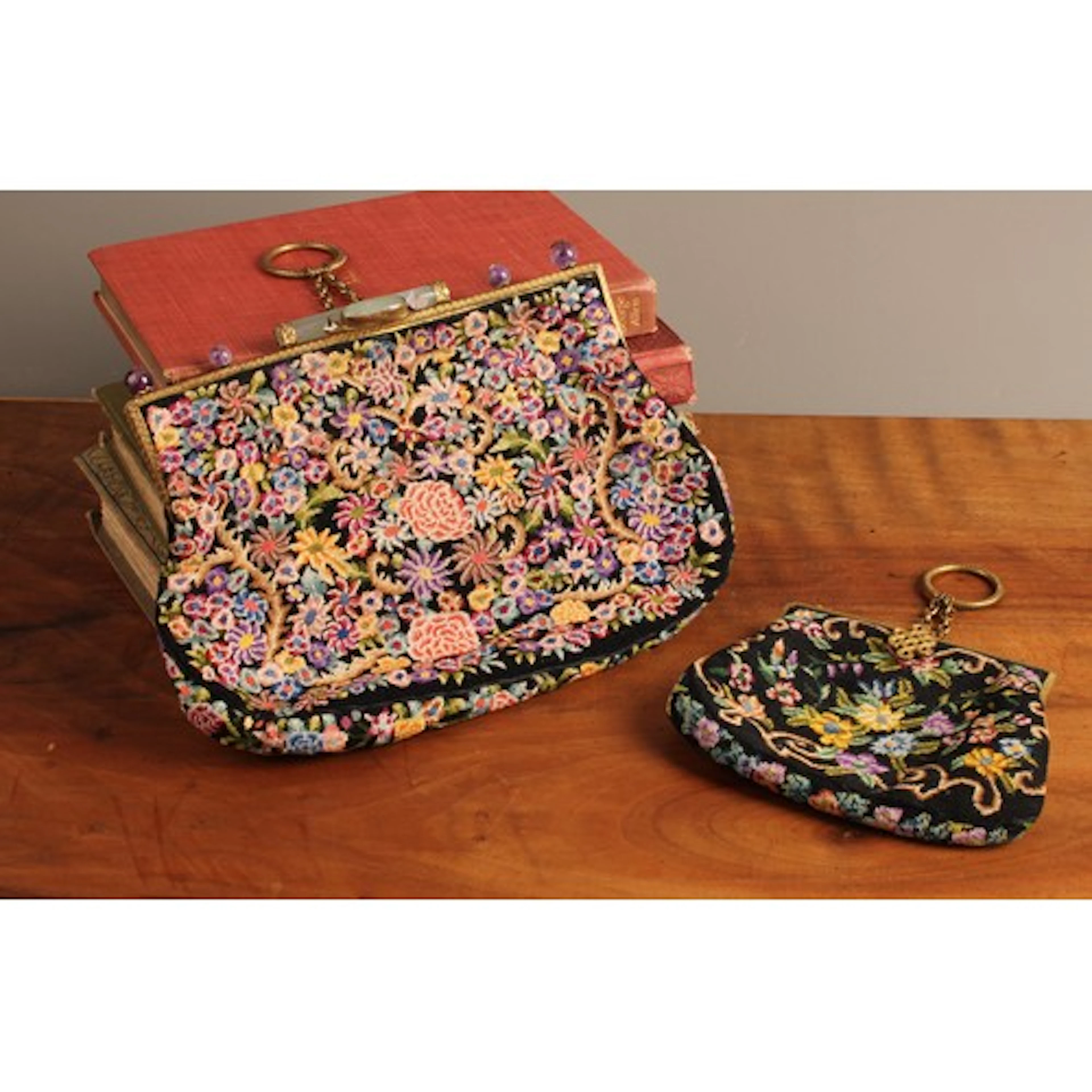 A mid-20th century petit point needlepoint evening bag, encl...