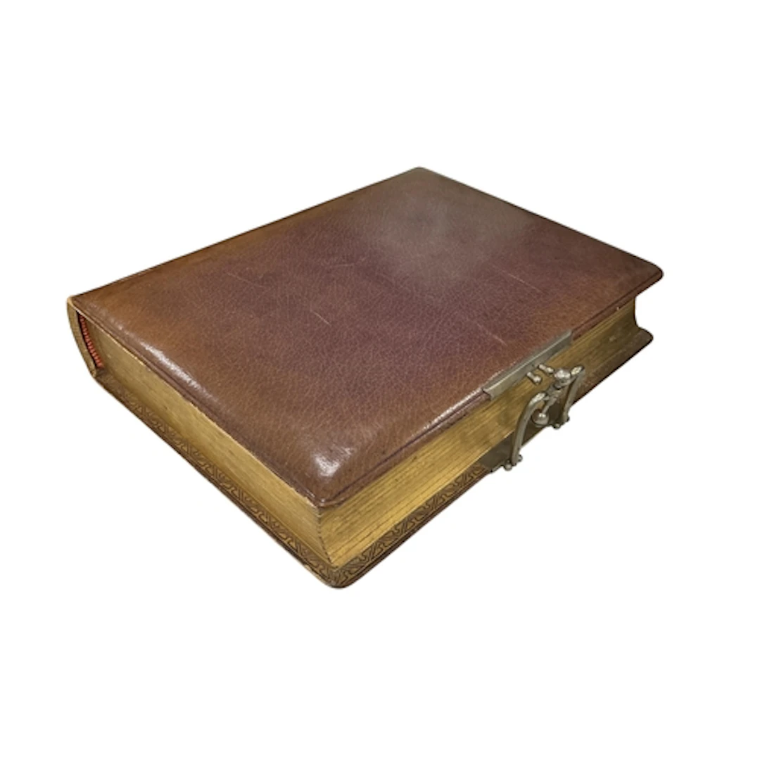 A late Victorian tan leather photograph album containing mon...