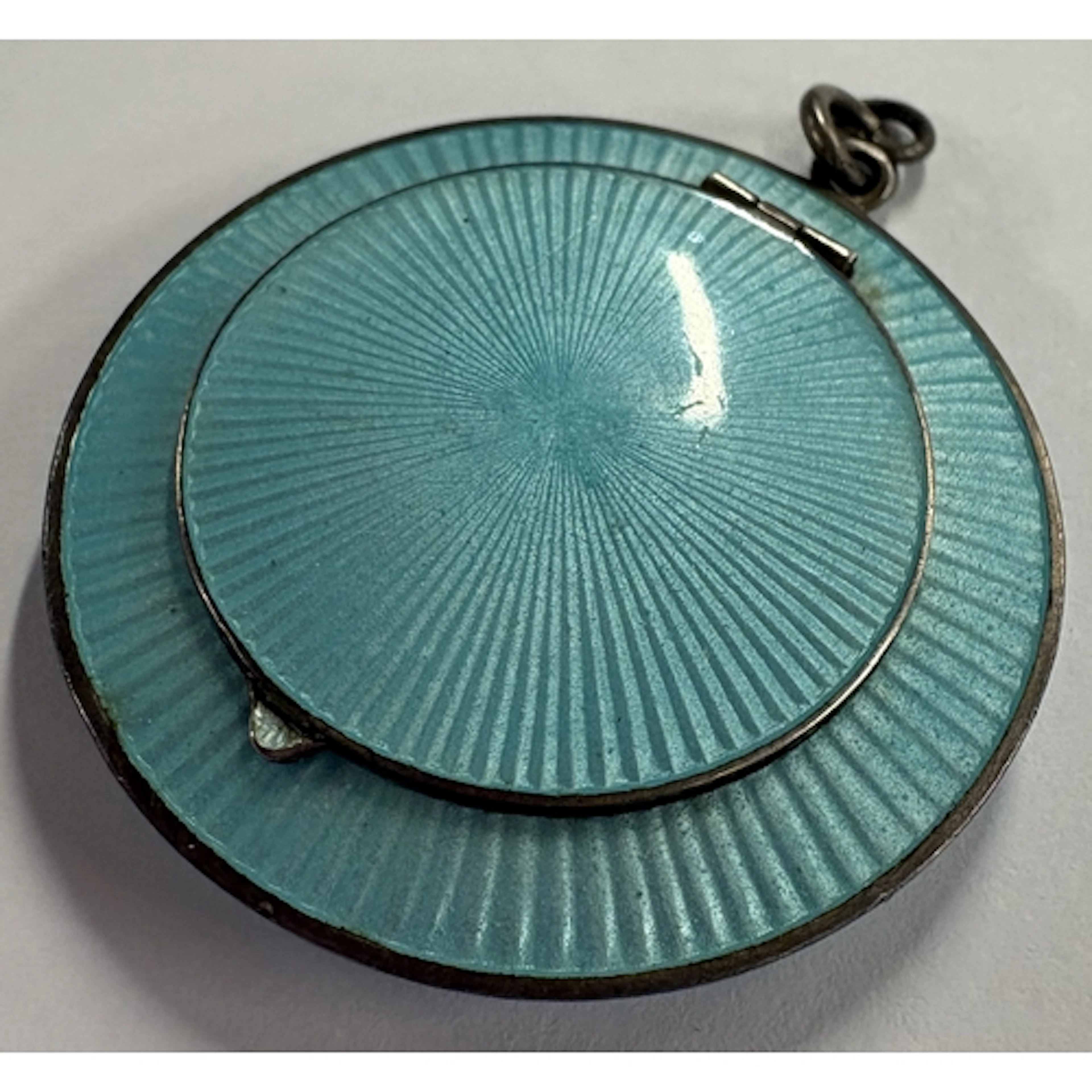 A Continental silver and light blue enamelled compact. Appro...