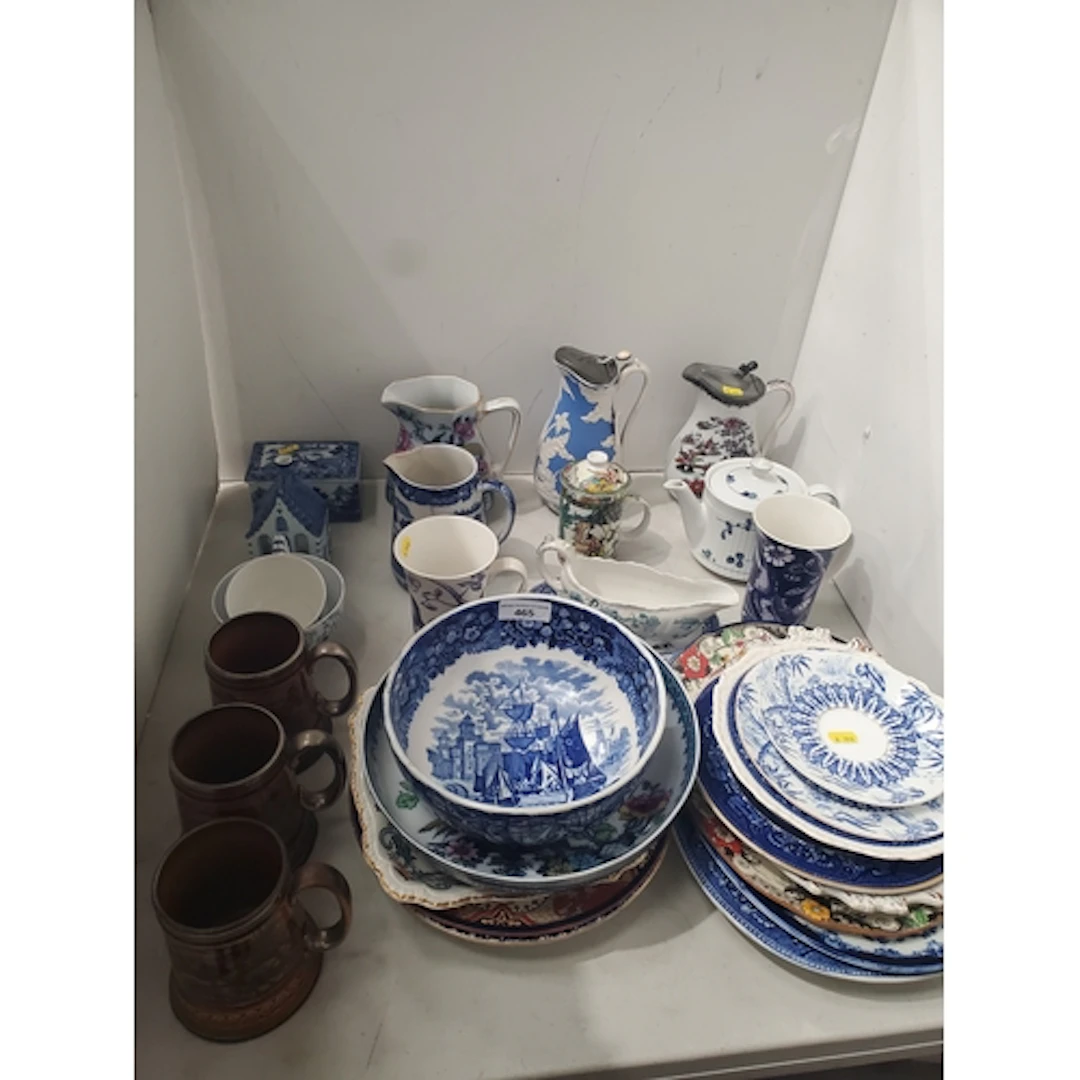 A collection of transfer decorated Jugs and Plates and three...