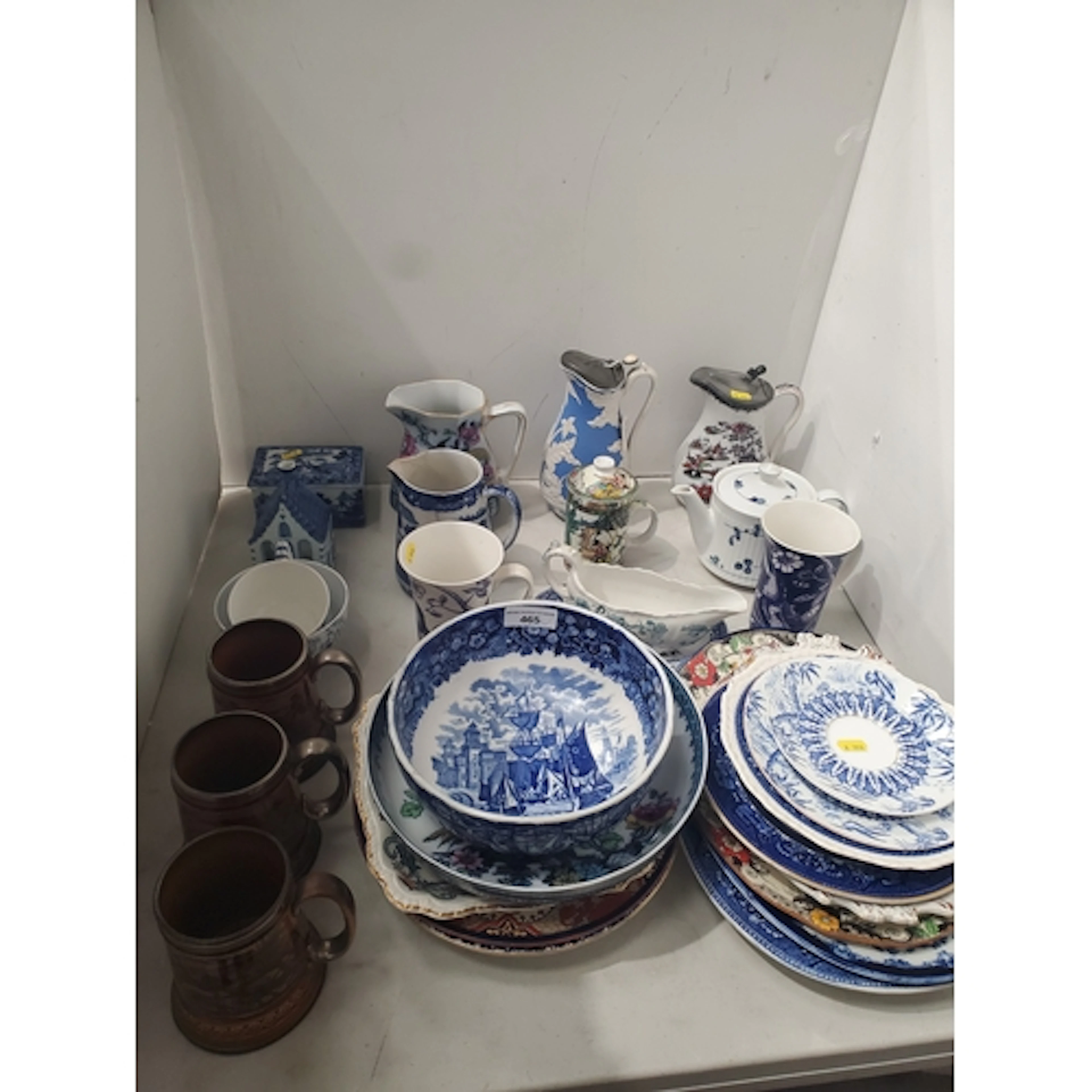 A collection of transfer decorated Jugs and Plates and three...