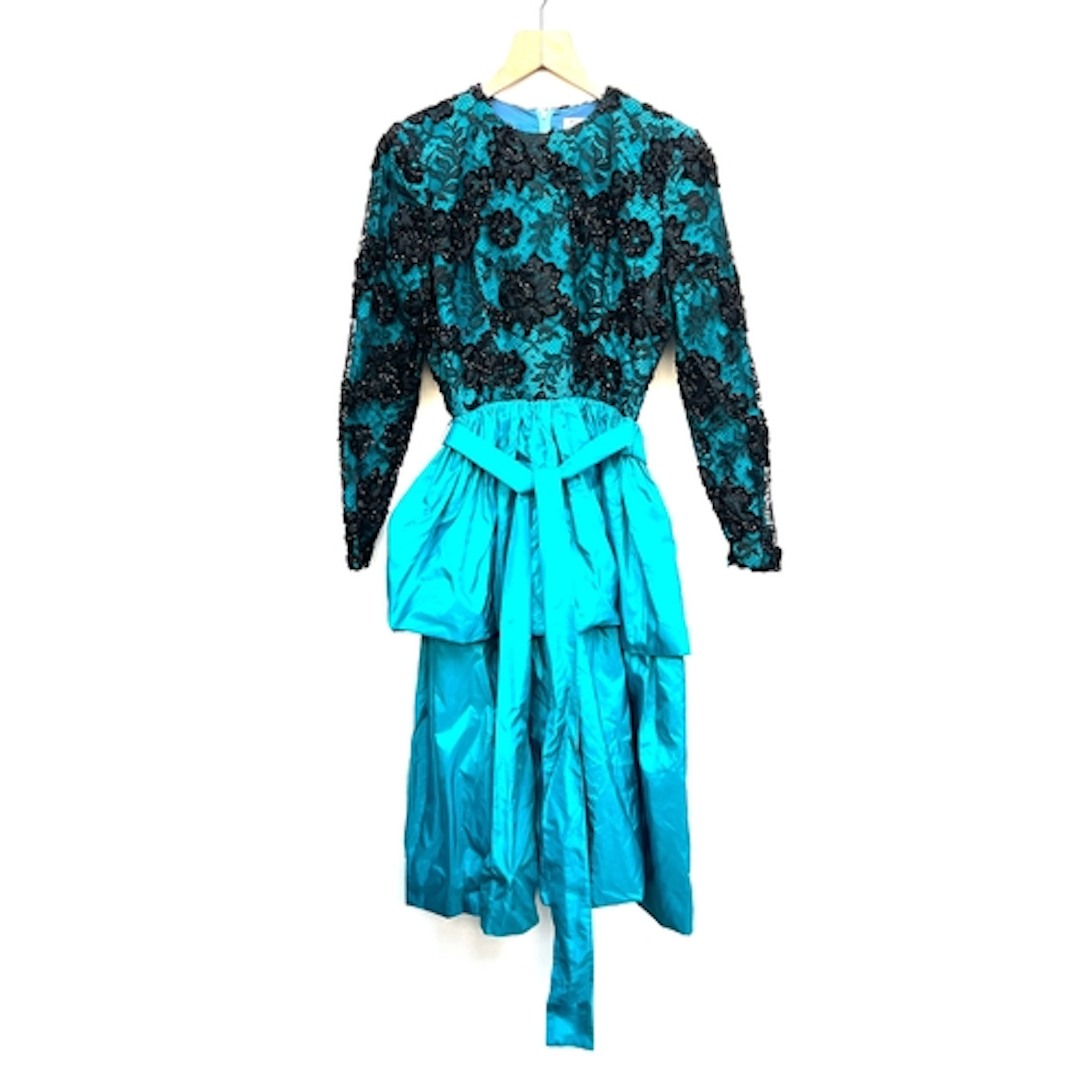 A Guy Laroche turquoise dress with black lace top and silk r...
