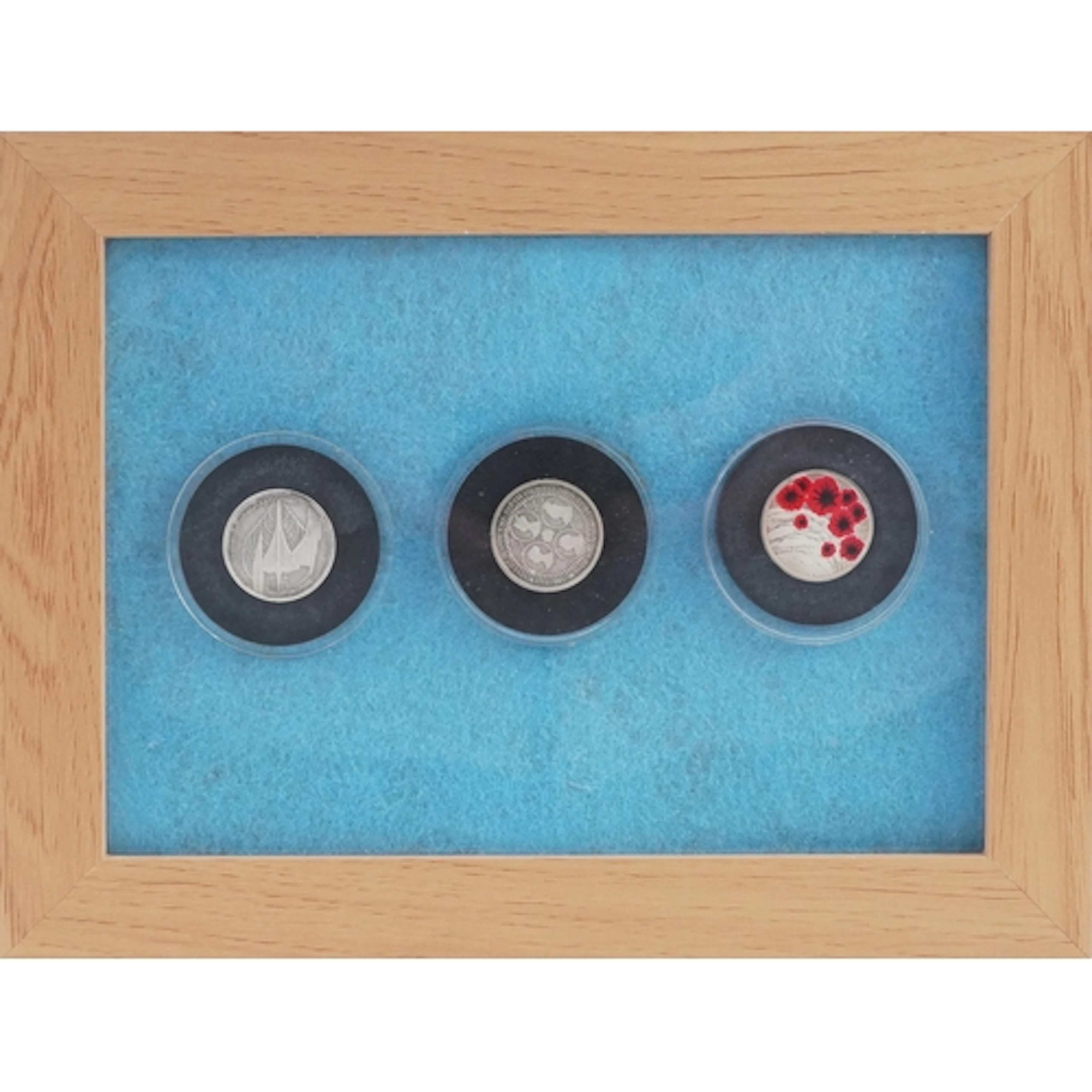 Three commemorative solid silver proof one pound coins compr...