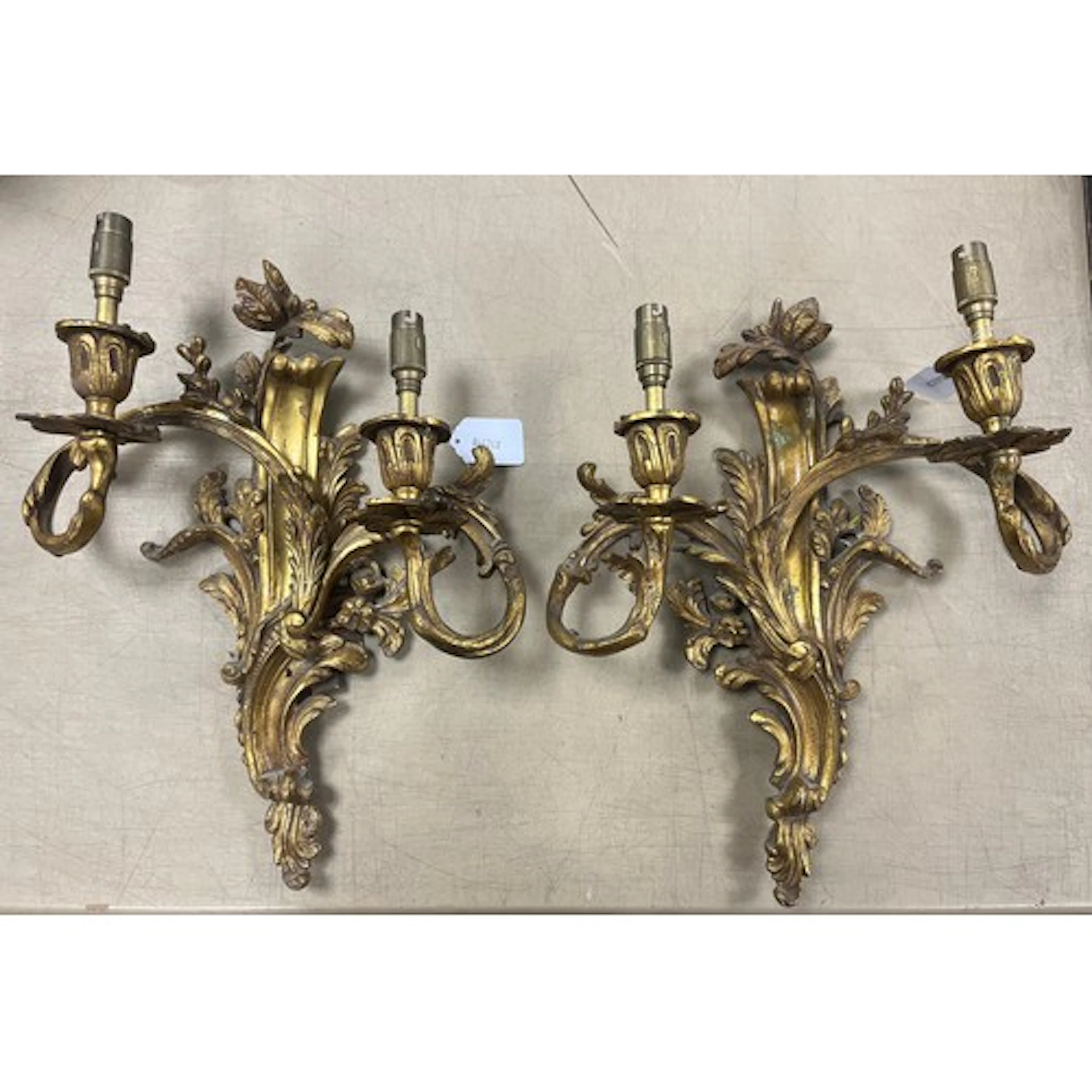 Pair of gilt metal twin branch candle sconces, converted to ...