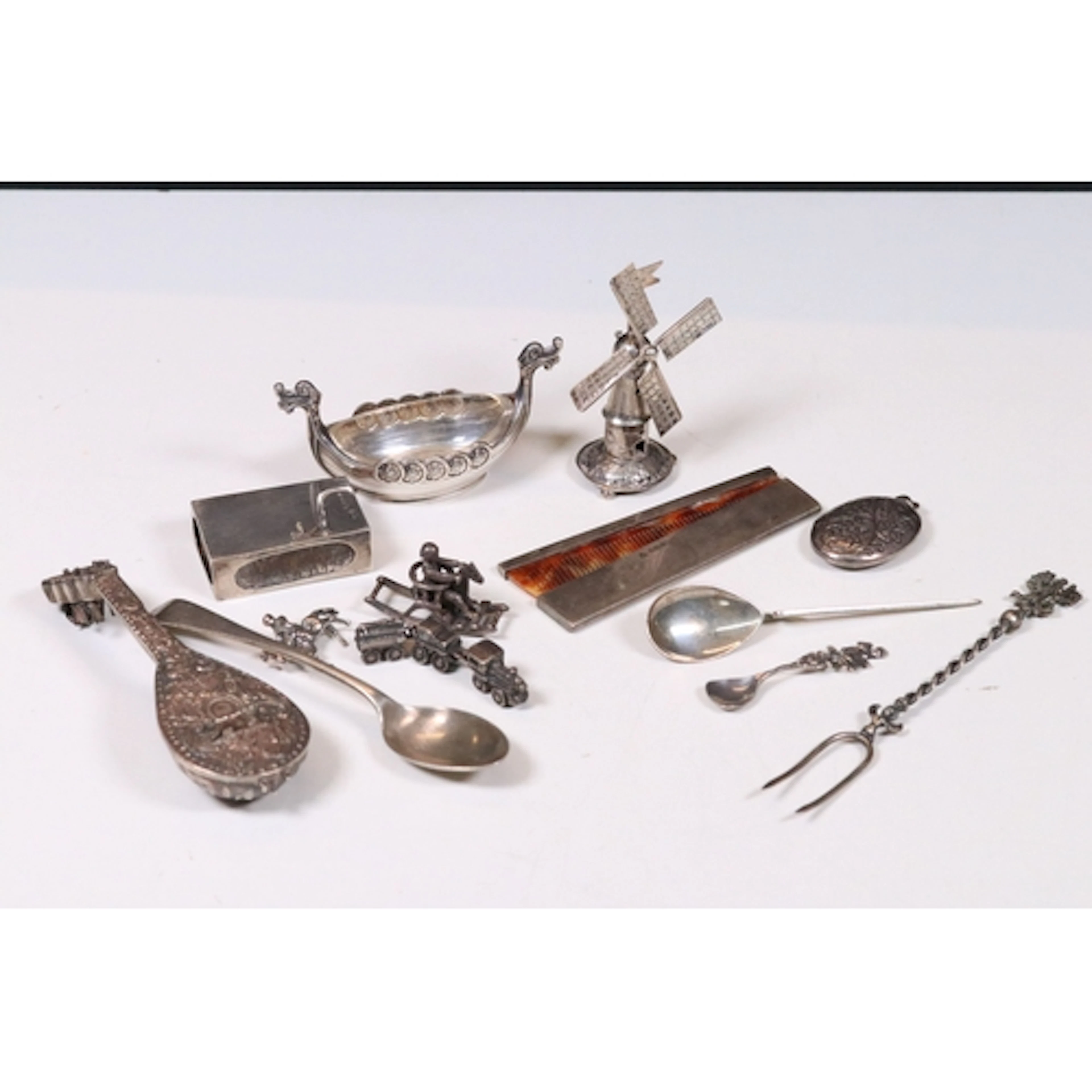 Collection of silver and white metal items to include Norweg...