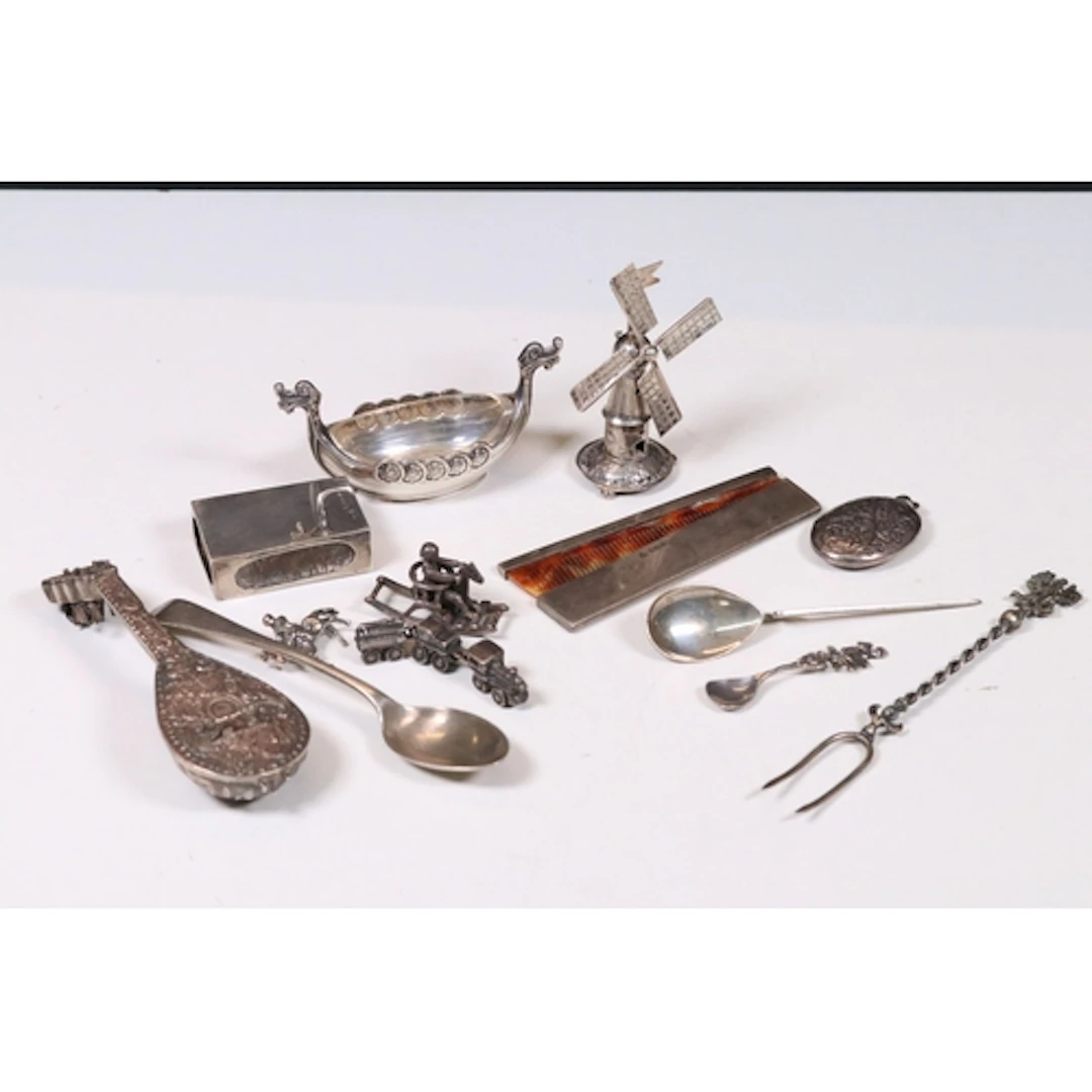 Collection of silver and white metal items to include Norweg...