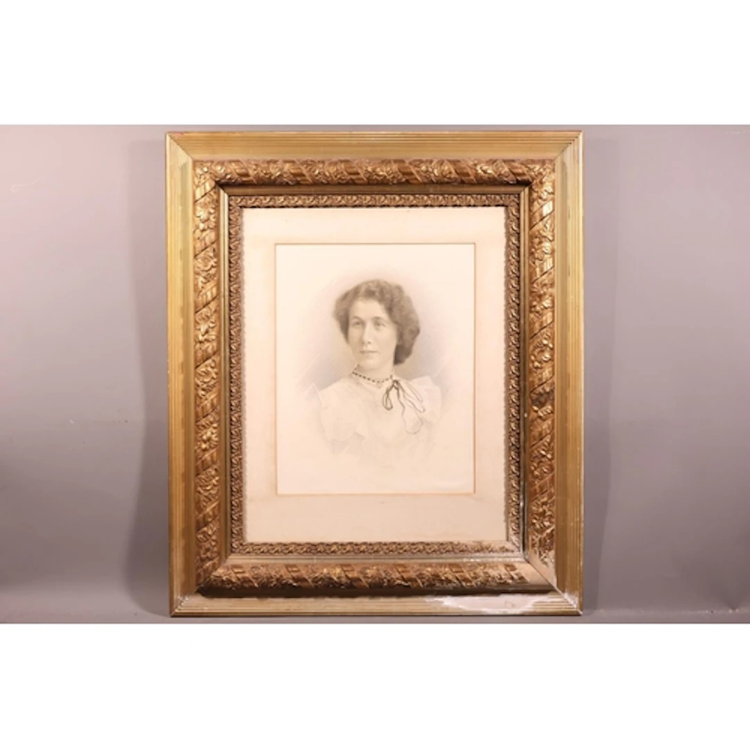 Gilt frames portrait of a woman, indistinctly pencil signed ...