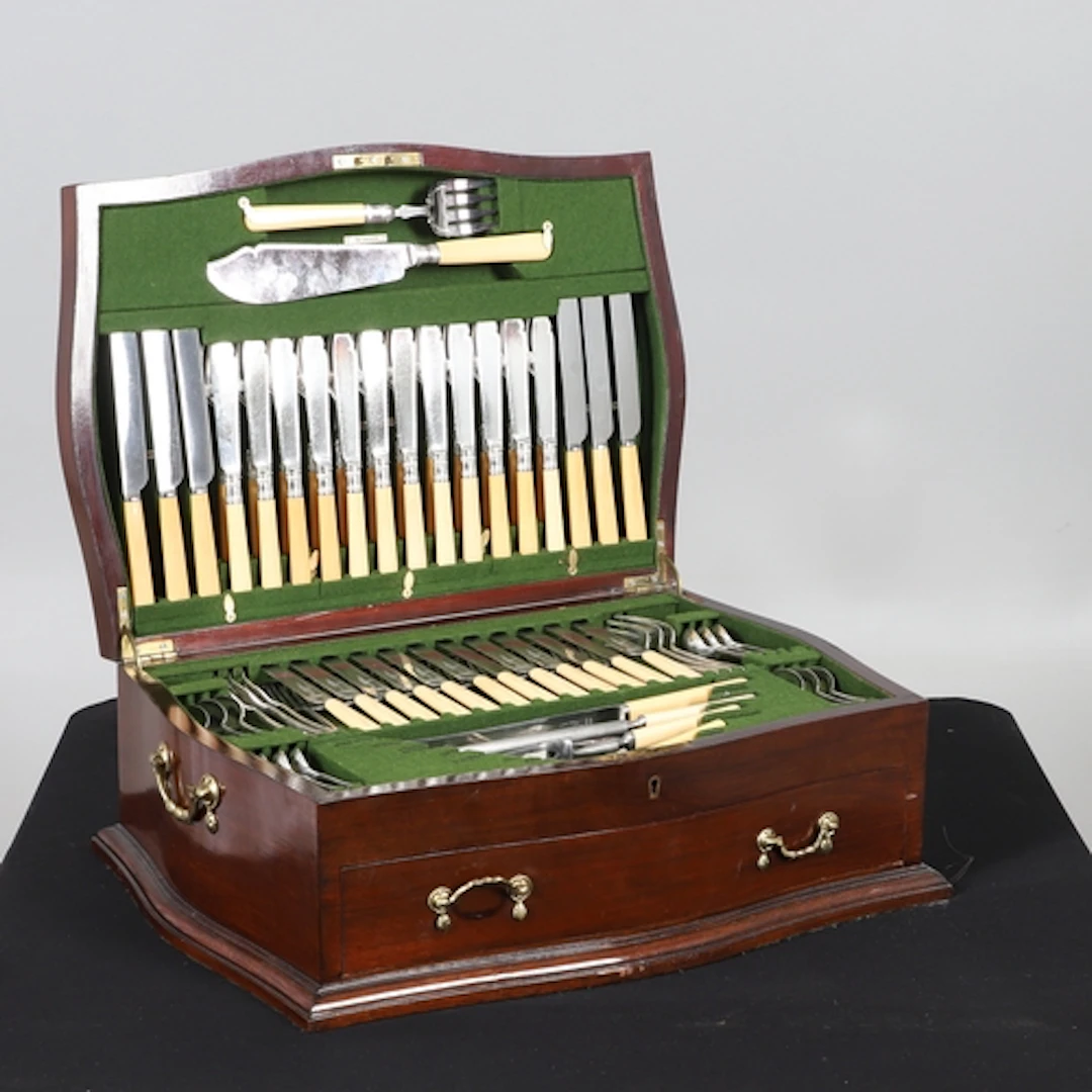 A PART MADE UP CANTEEN OF SILVER AND SILVER PLATED CUTLERY. ...