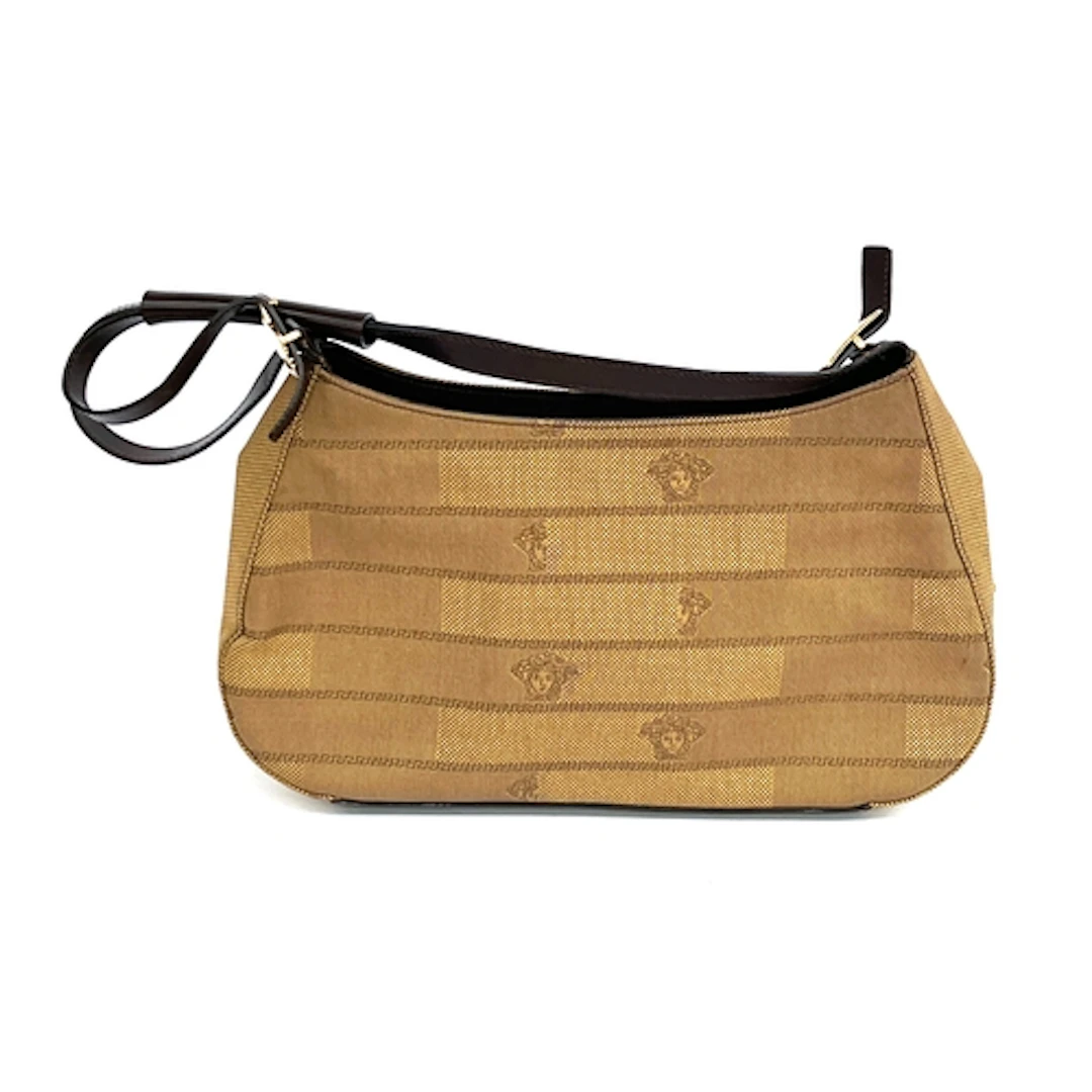 A Gianni Versace brown monogram canvas shoulder bag, gold to...