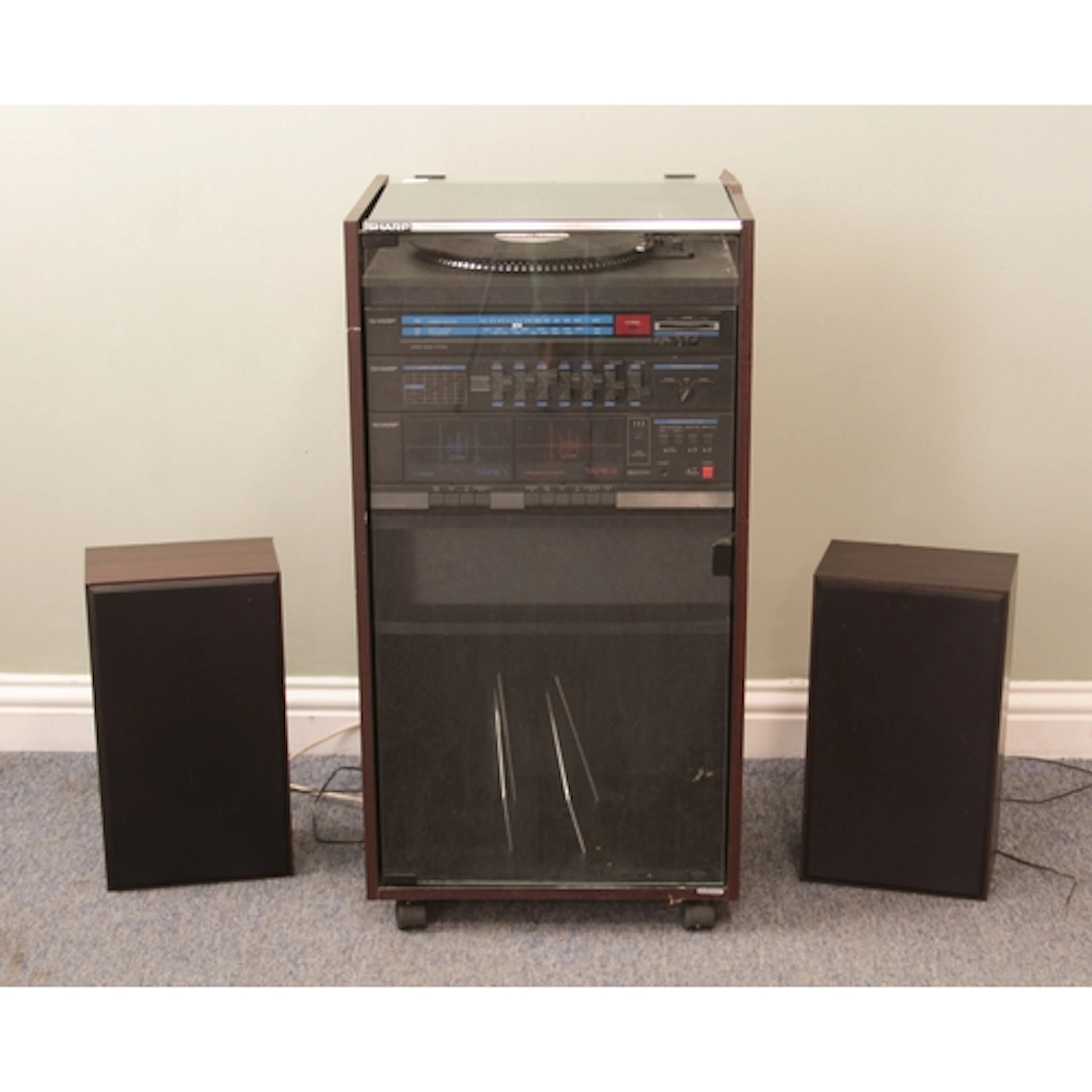 A vintage 1980s Sharp hi-fi system - with turntable, double ...