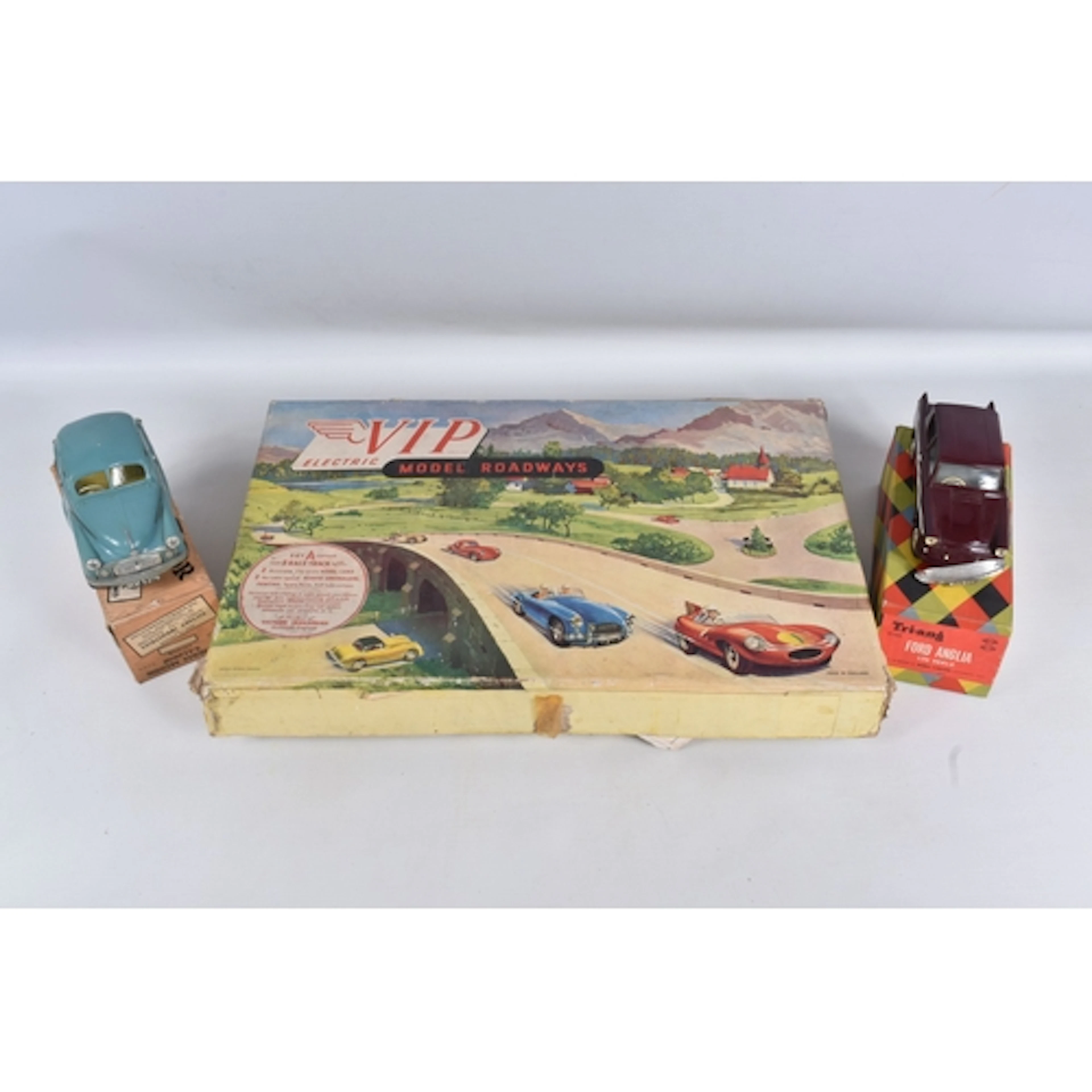 A SELECTION OF BOXED VINTAGE CAR SETS AND MODELS, to include...