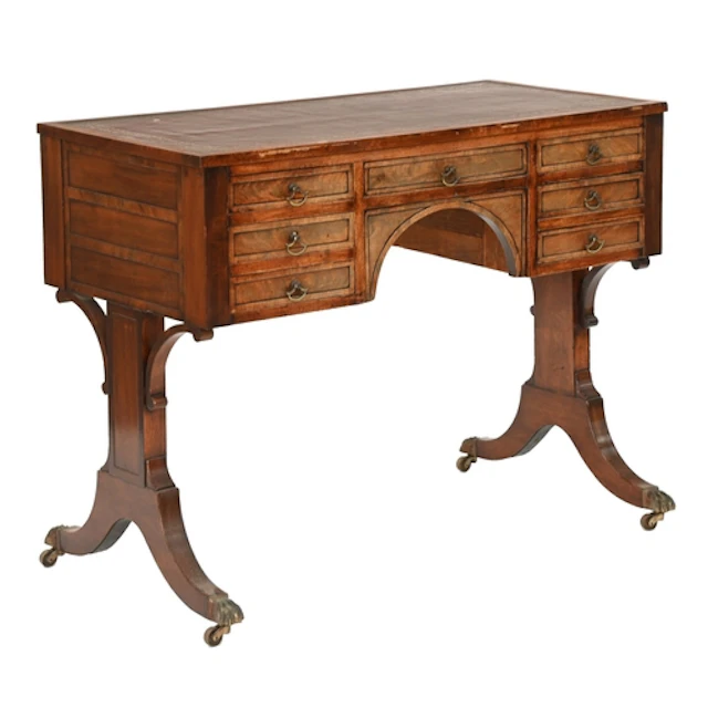 A George IV mahogany writing table, the rectangular leather ...