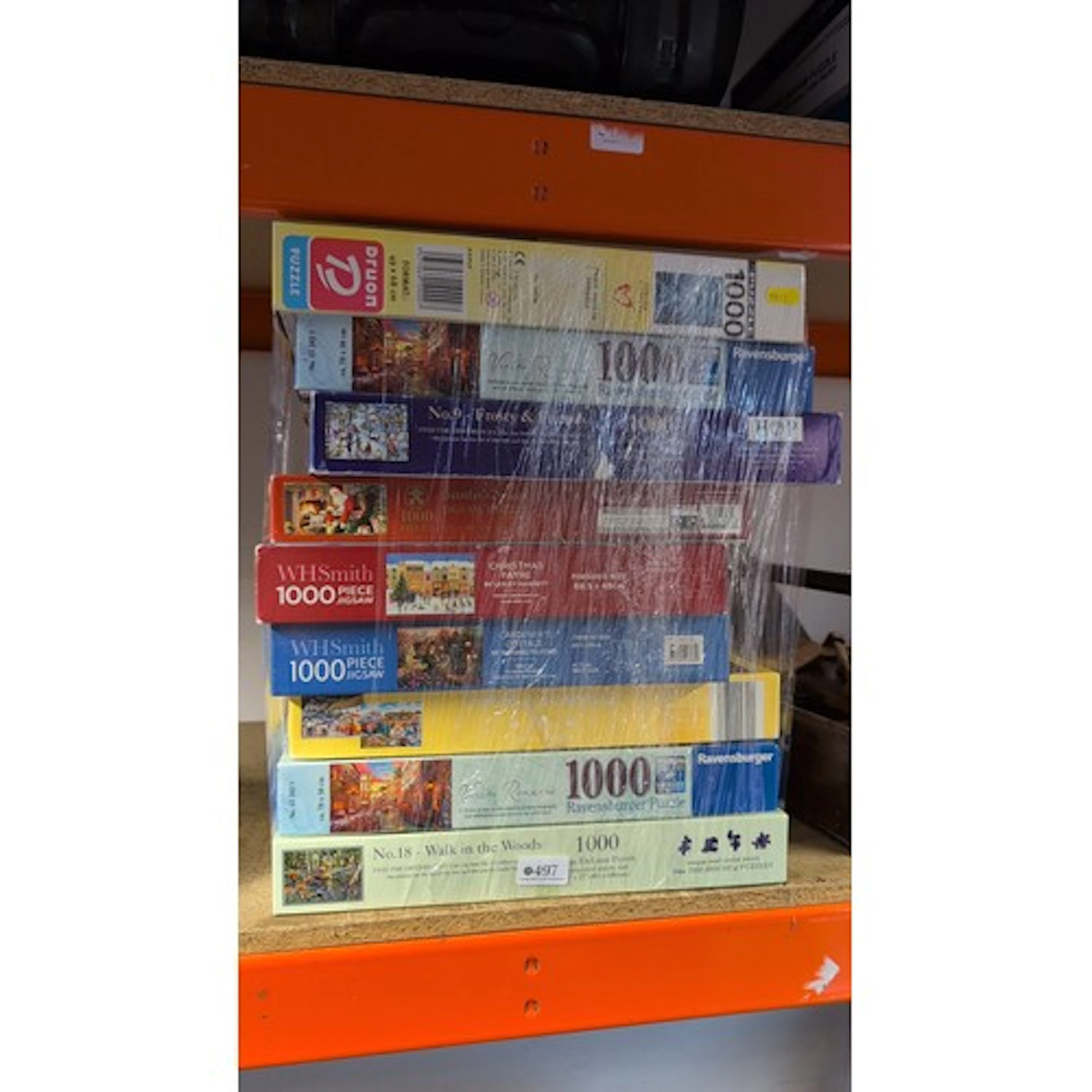 A quantity of assorted boxed jigsaw puzzles, including Raven...