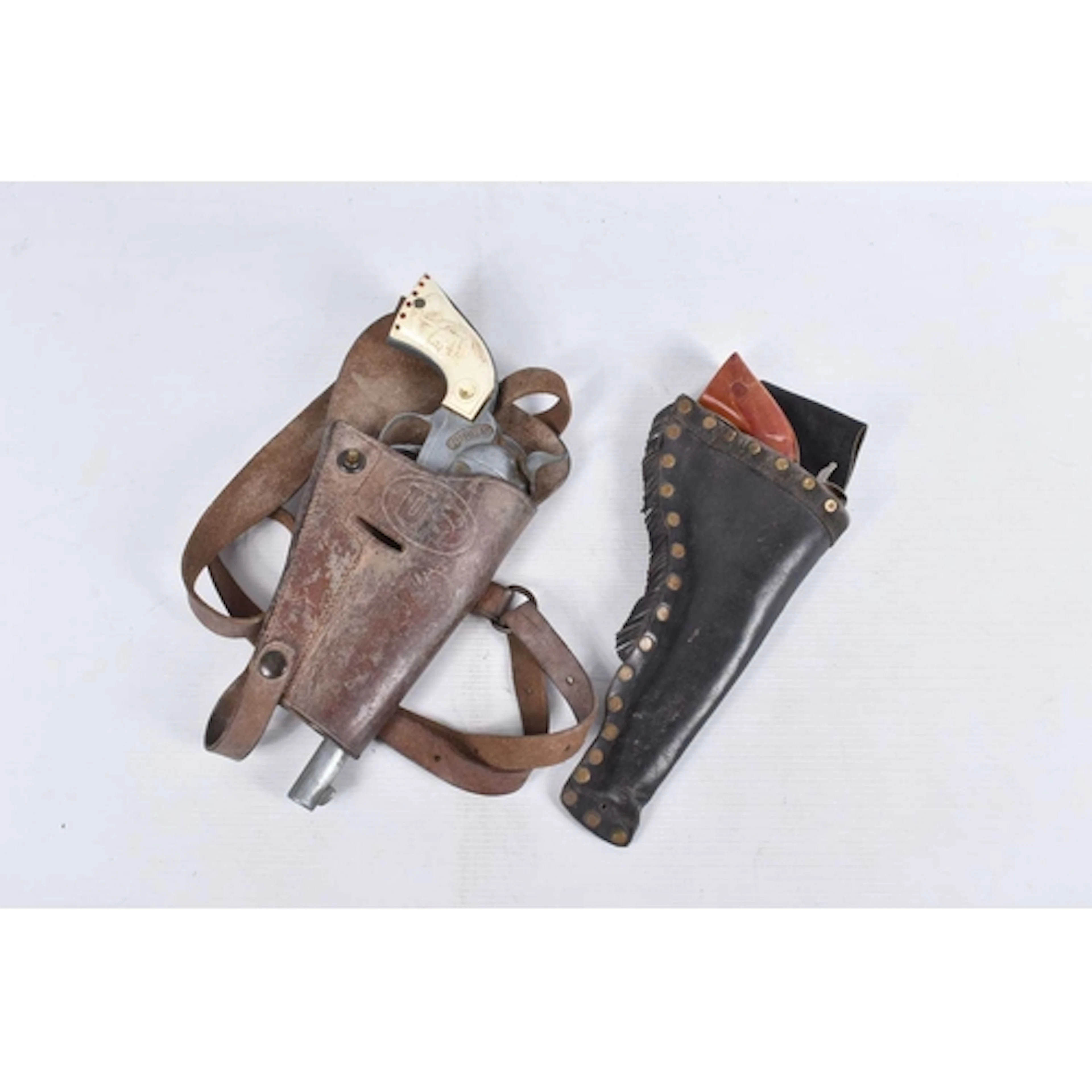 TWO VINTAGE 1950's HUBLEY CAP FIRING WILD WEST PISTOLS IN LE...