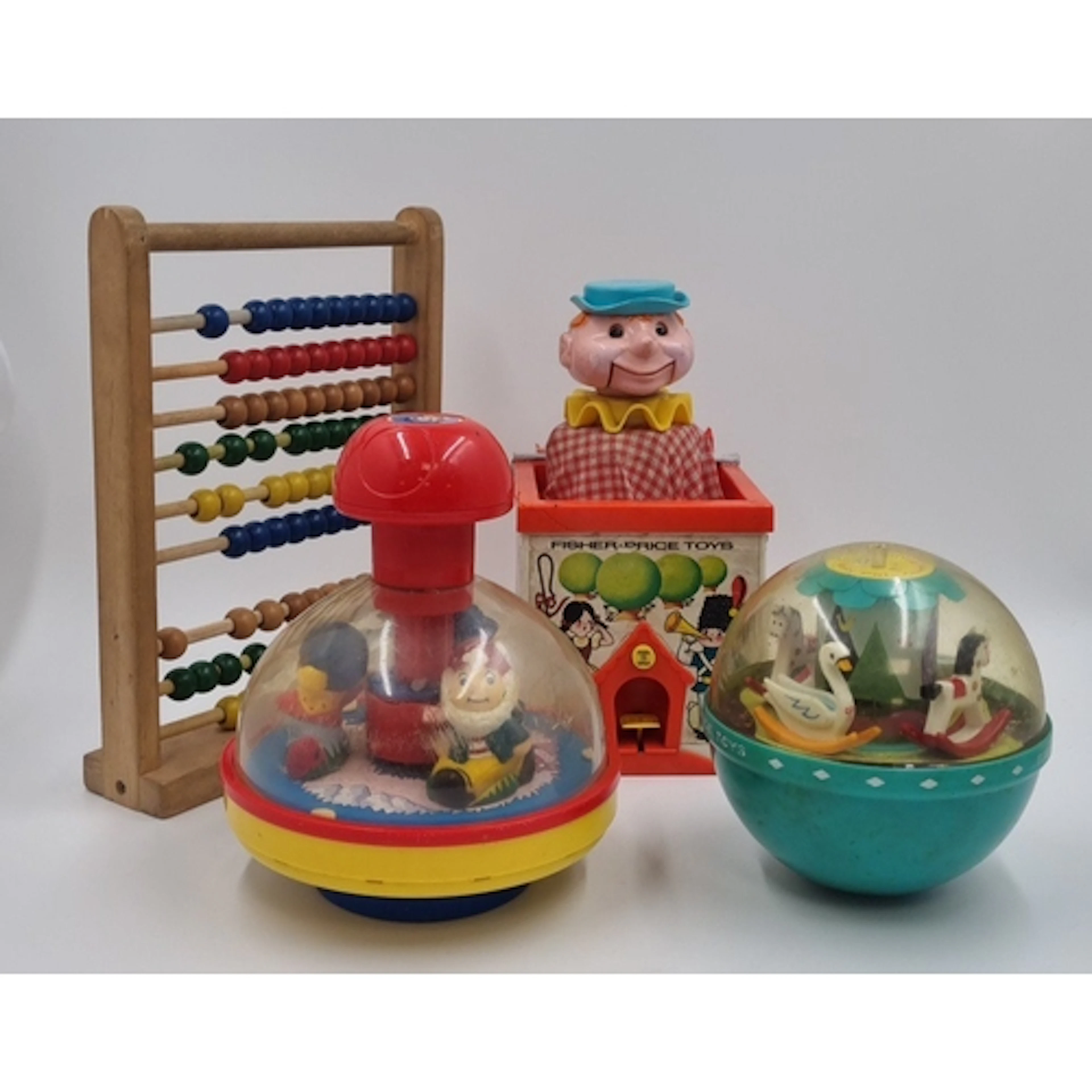 Wooden bead abacus, two Fisher-Price plastic dome spinning t...