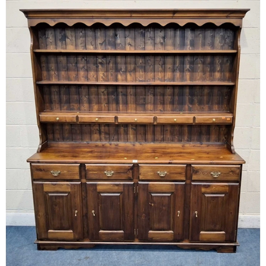 A MODERN PINE DRESSER, the four-tier plate rack with five dr...