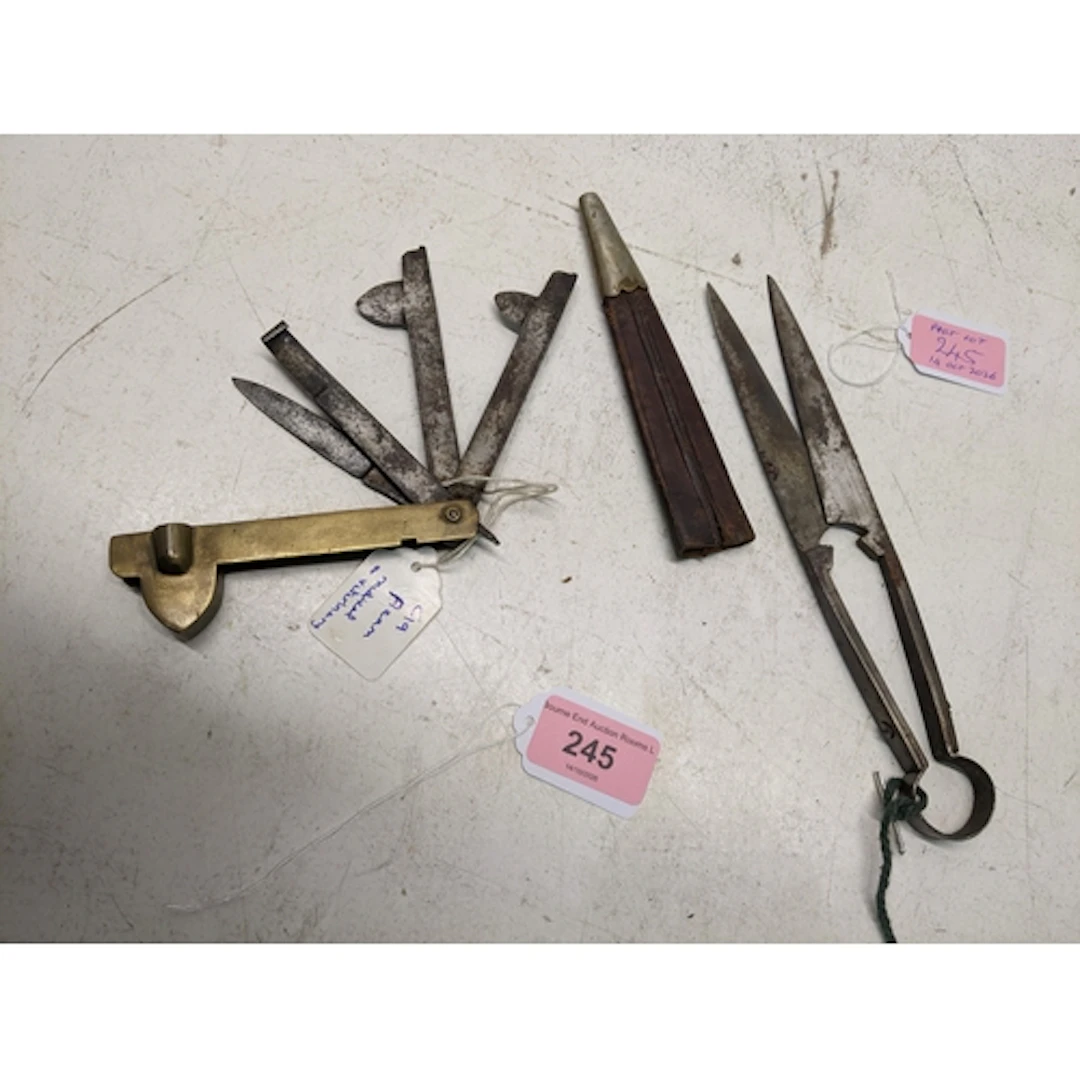 A 19th century brass and steel fleam, and an antique hand fo...