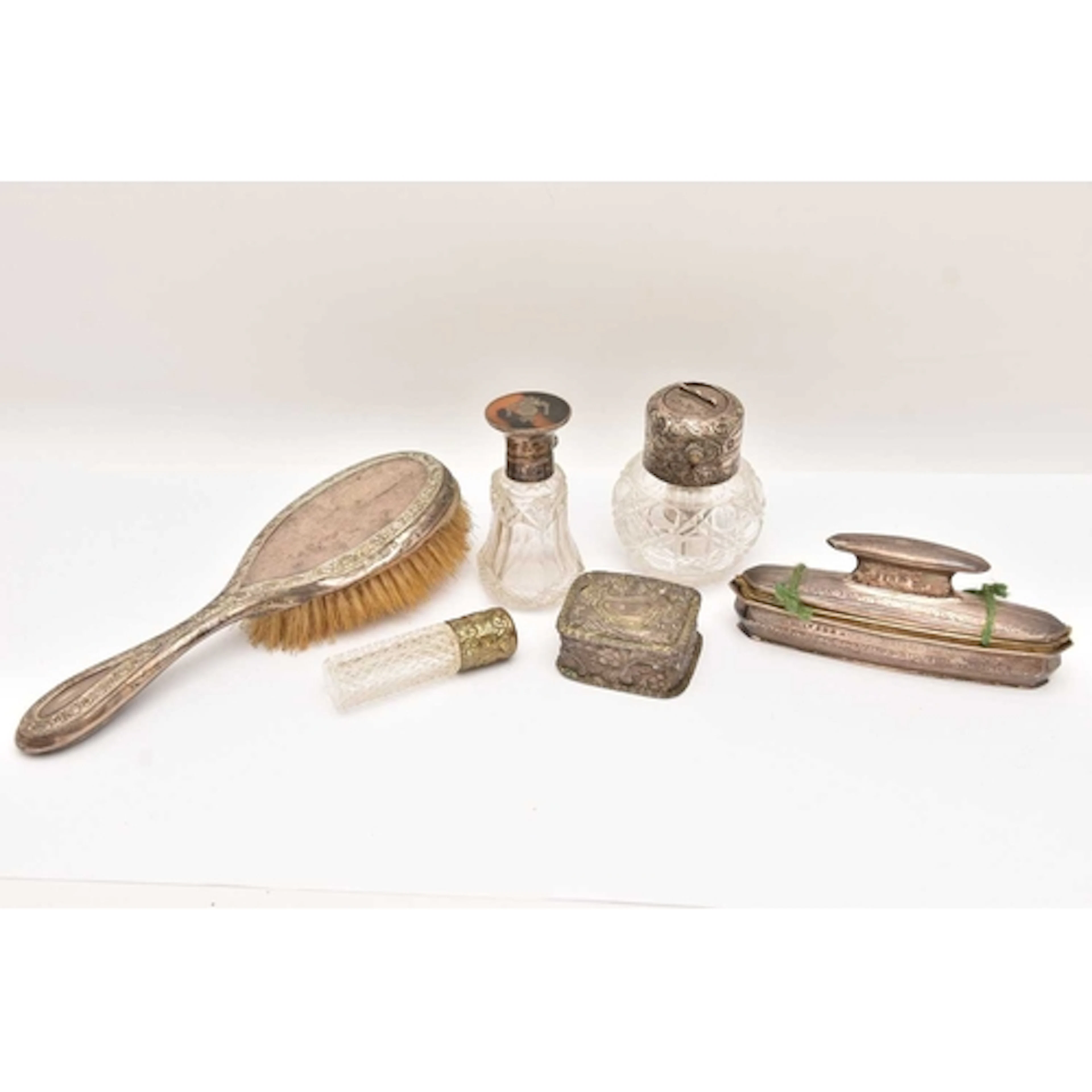FIVE ITEMS OF SILVER, to include a cut glass and silver moun...