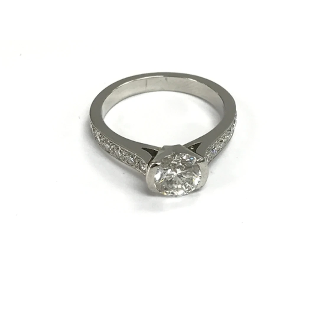 White gold diamond ring set with 1.5ct central stone and fur...