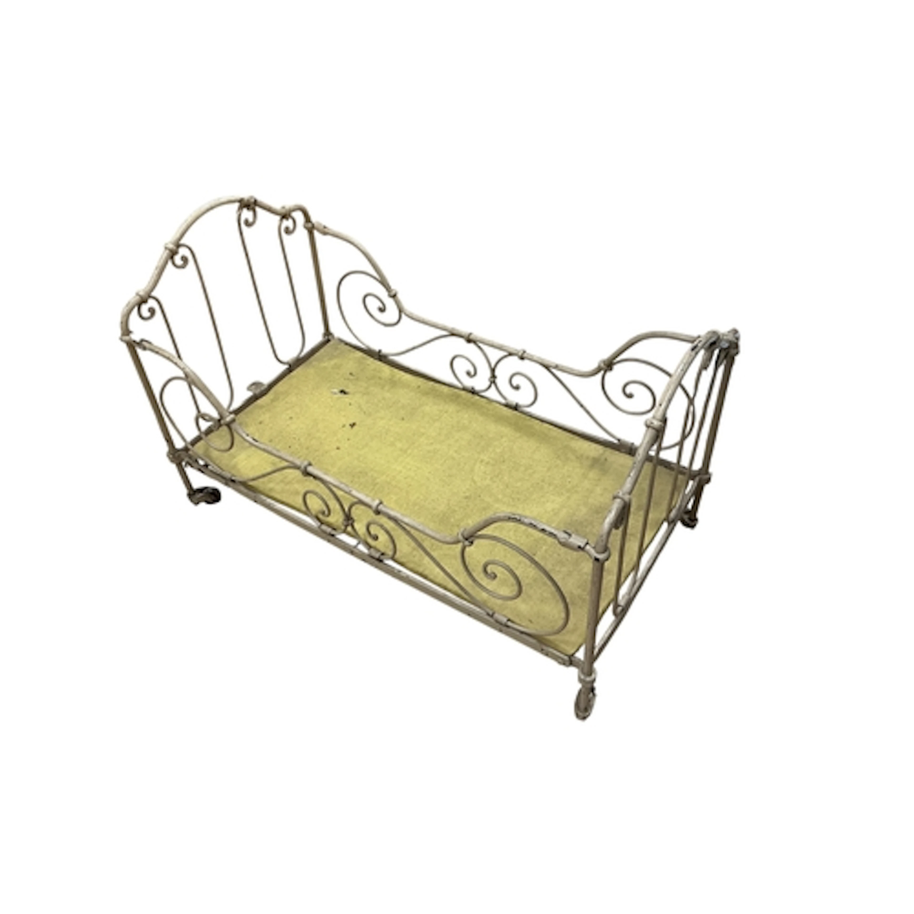 A Victorian wrought iron doll's cot, 59cm in length