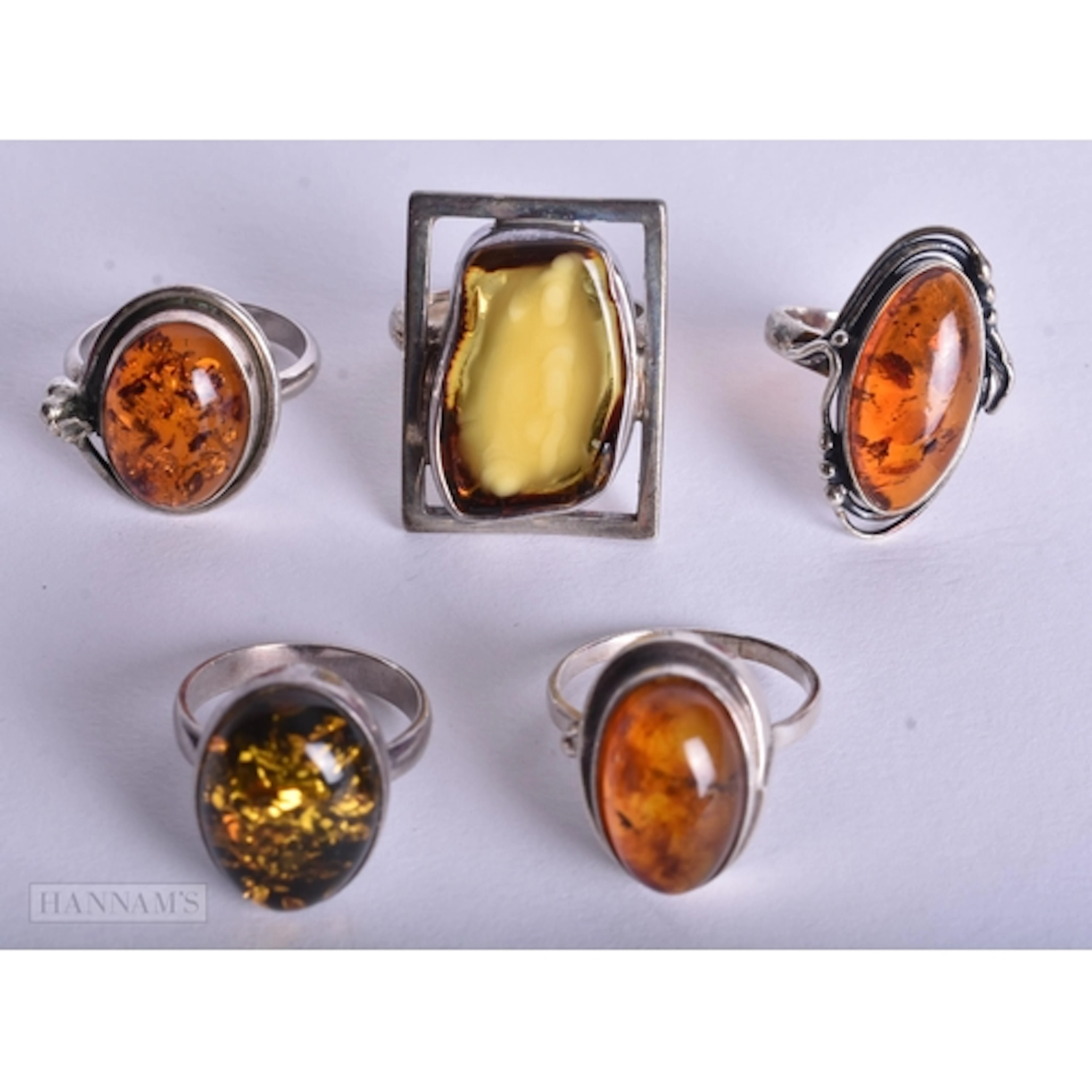 Collection of Sterling Silver Amber Rings inc. Baltic, Copal...