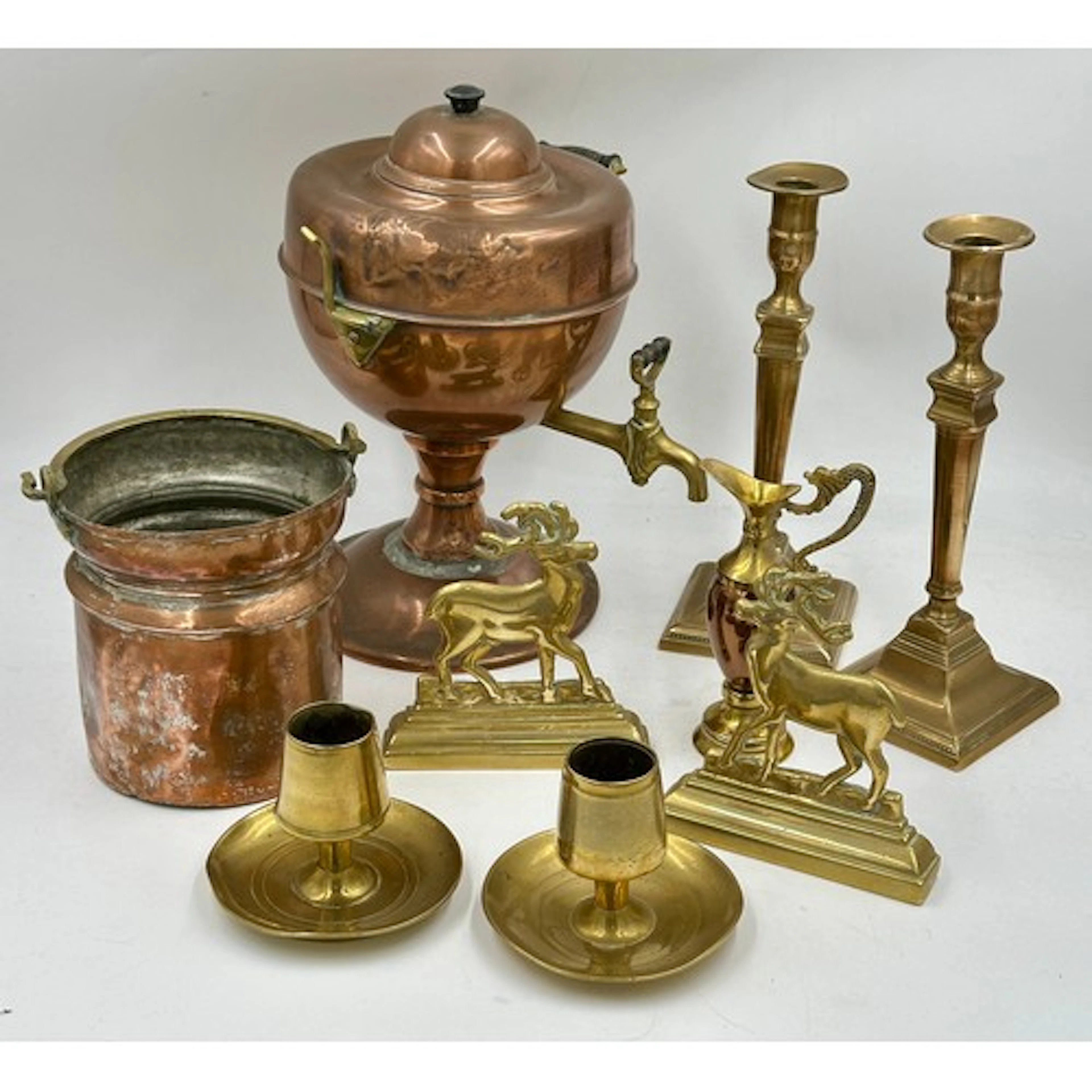 Brass and copper to include brass candle sticks and 2 stag d...