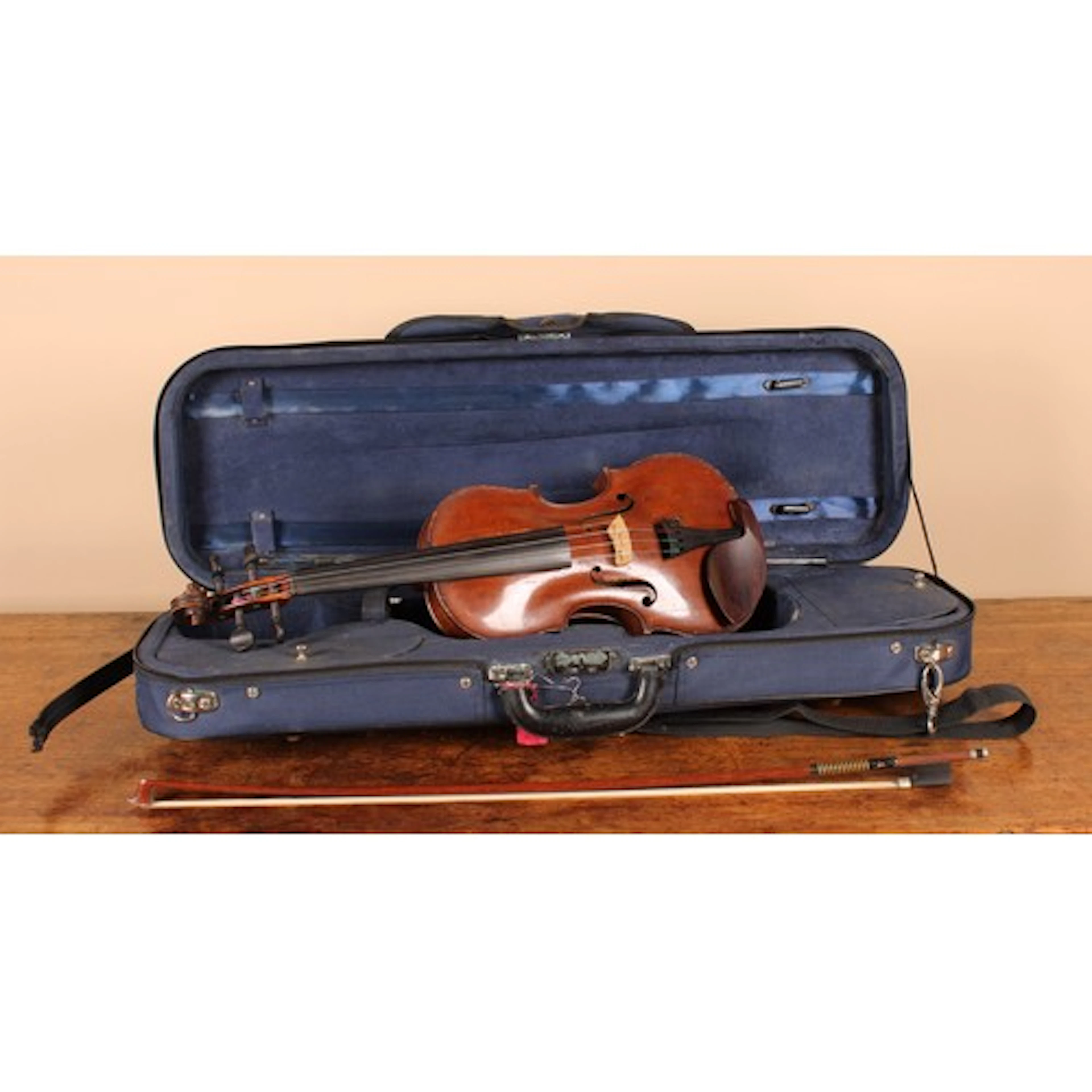 A 19th century English violin, the label inscribed Charles a...
