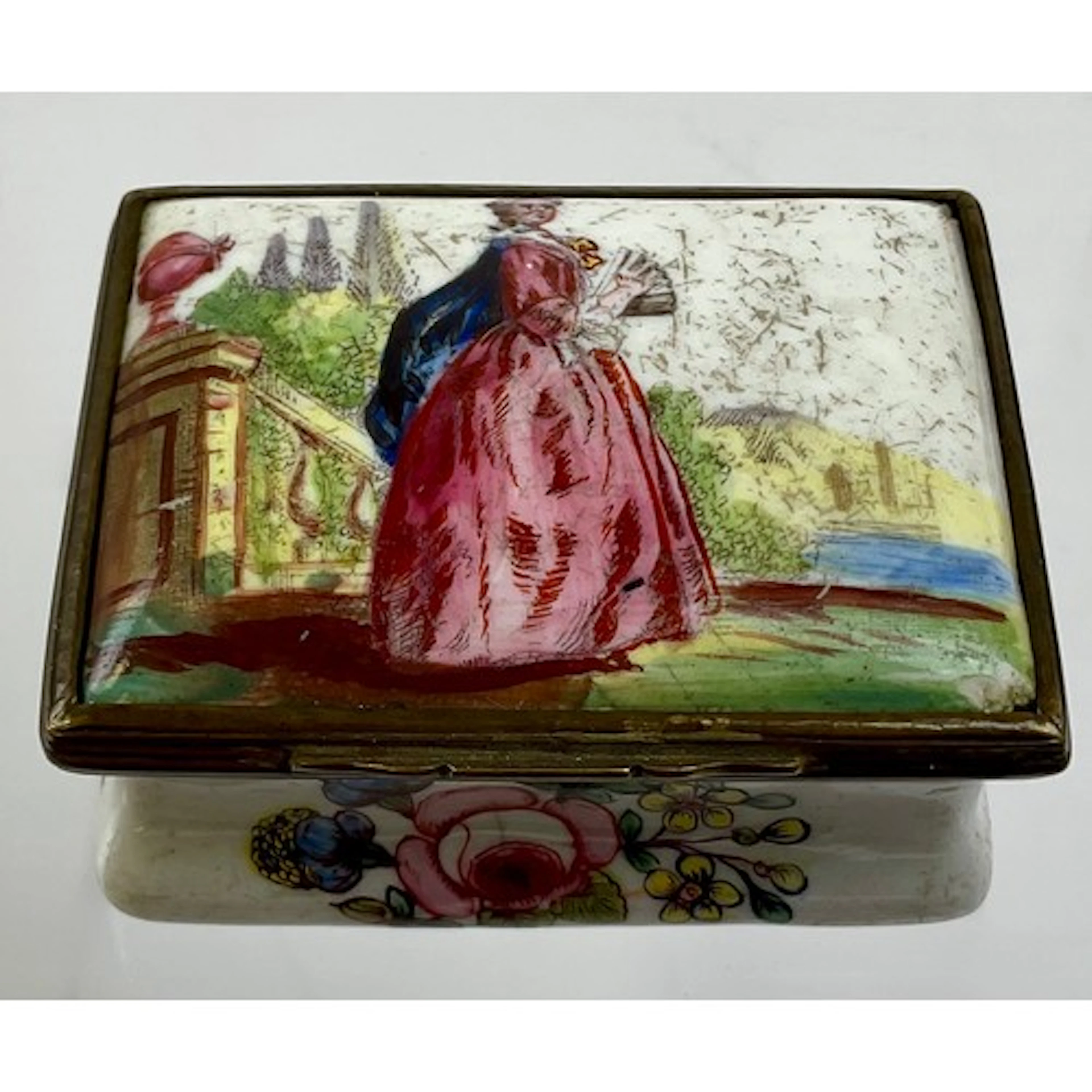 A George III South Staffordshire enamel and brass mounted re...