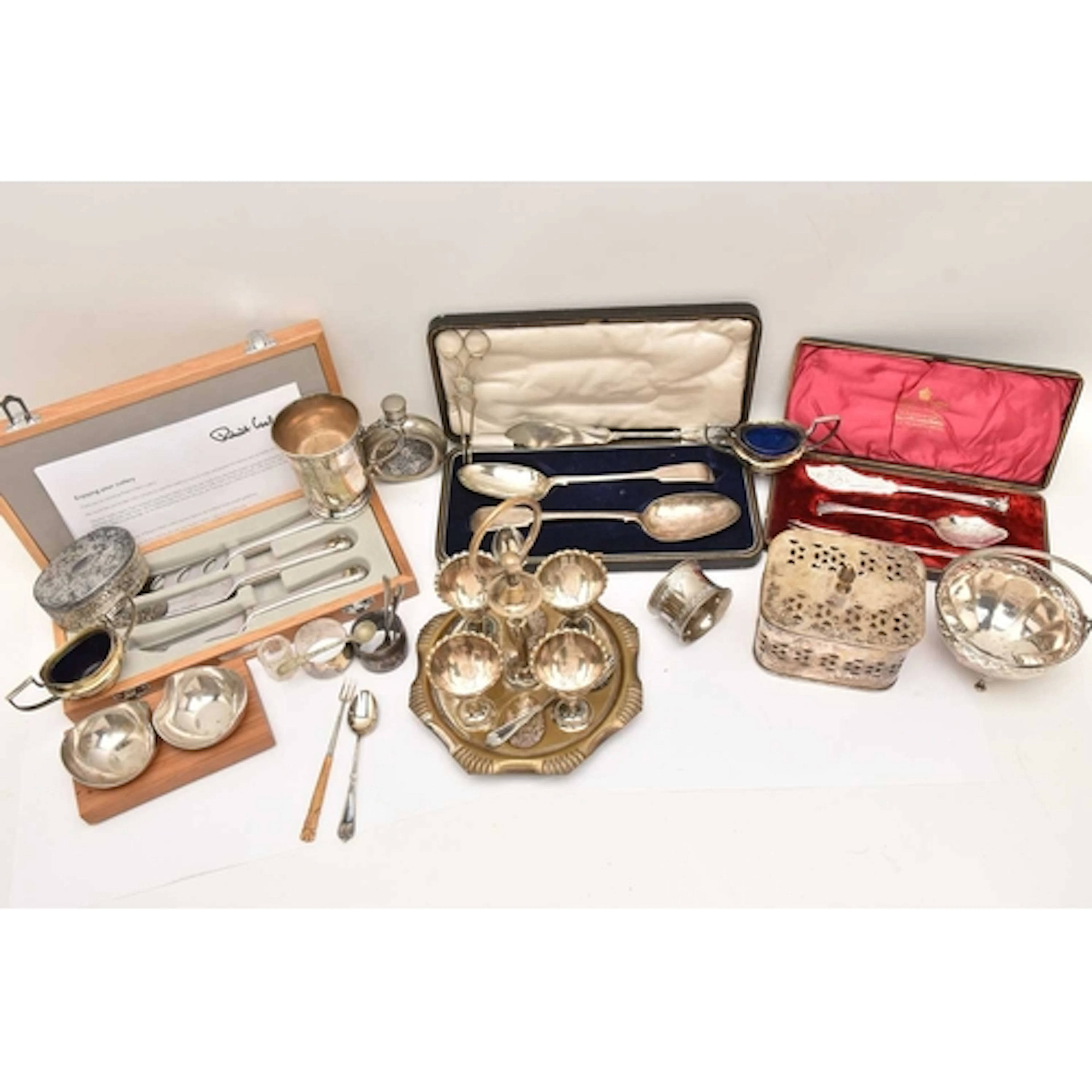 A BOX OF ASSORTED WHITE METAL WARE, to include an egg cup an...
