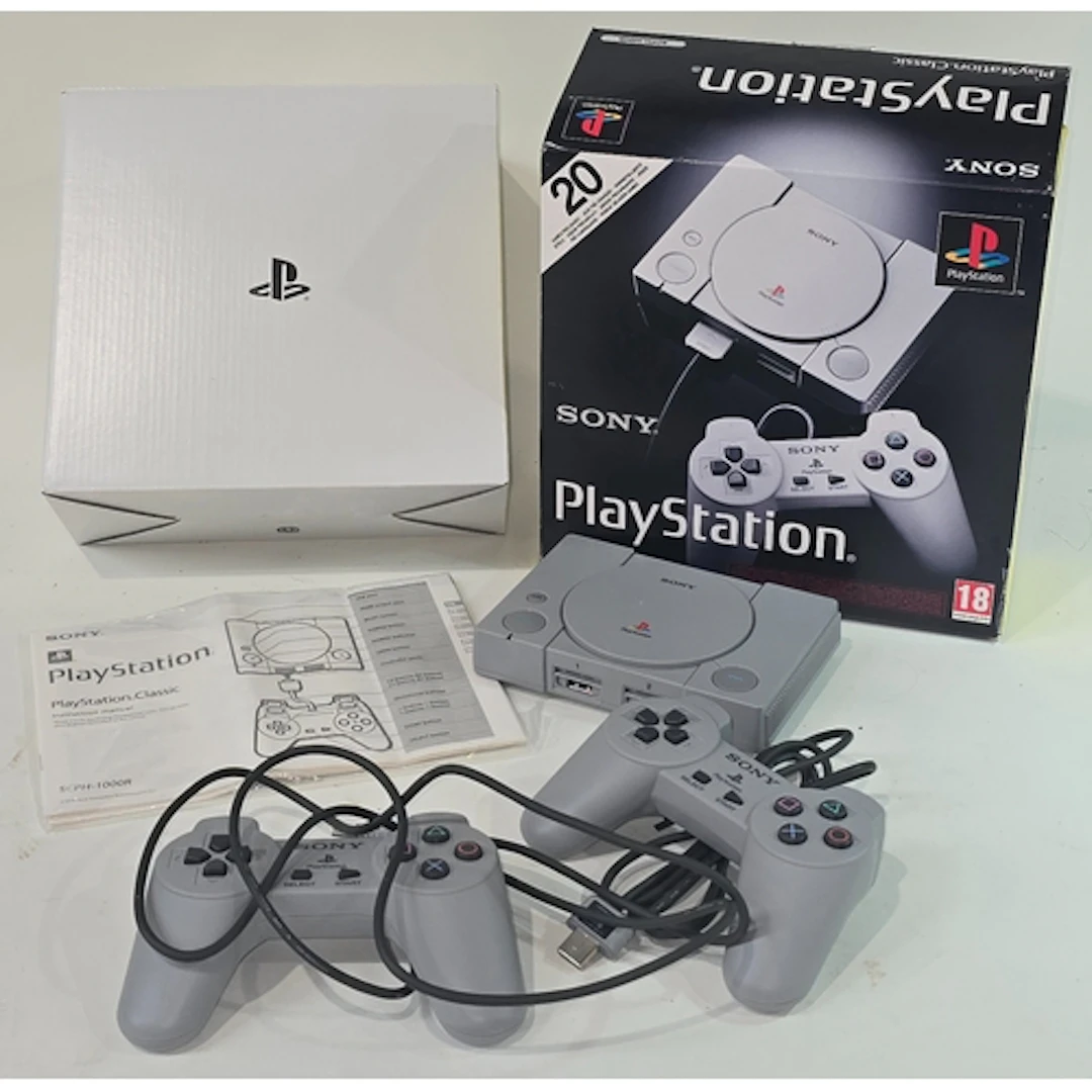 Sony PlayStation Classic console pre loaded with 20 games. C...