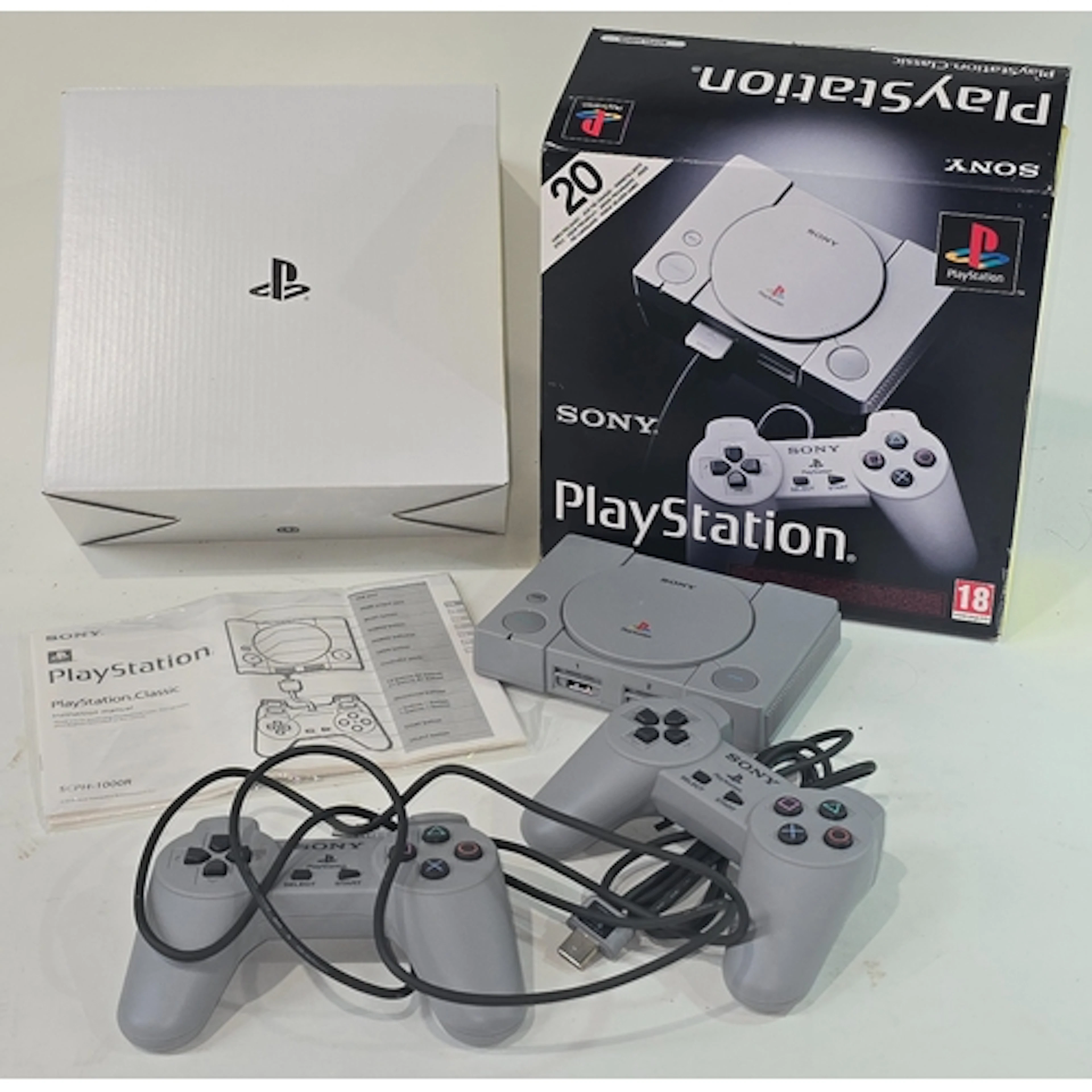 Sony PlayStation Classic console pre loaded with 20 games. C...