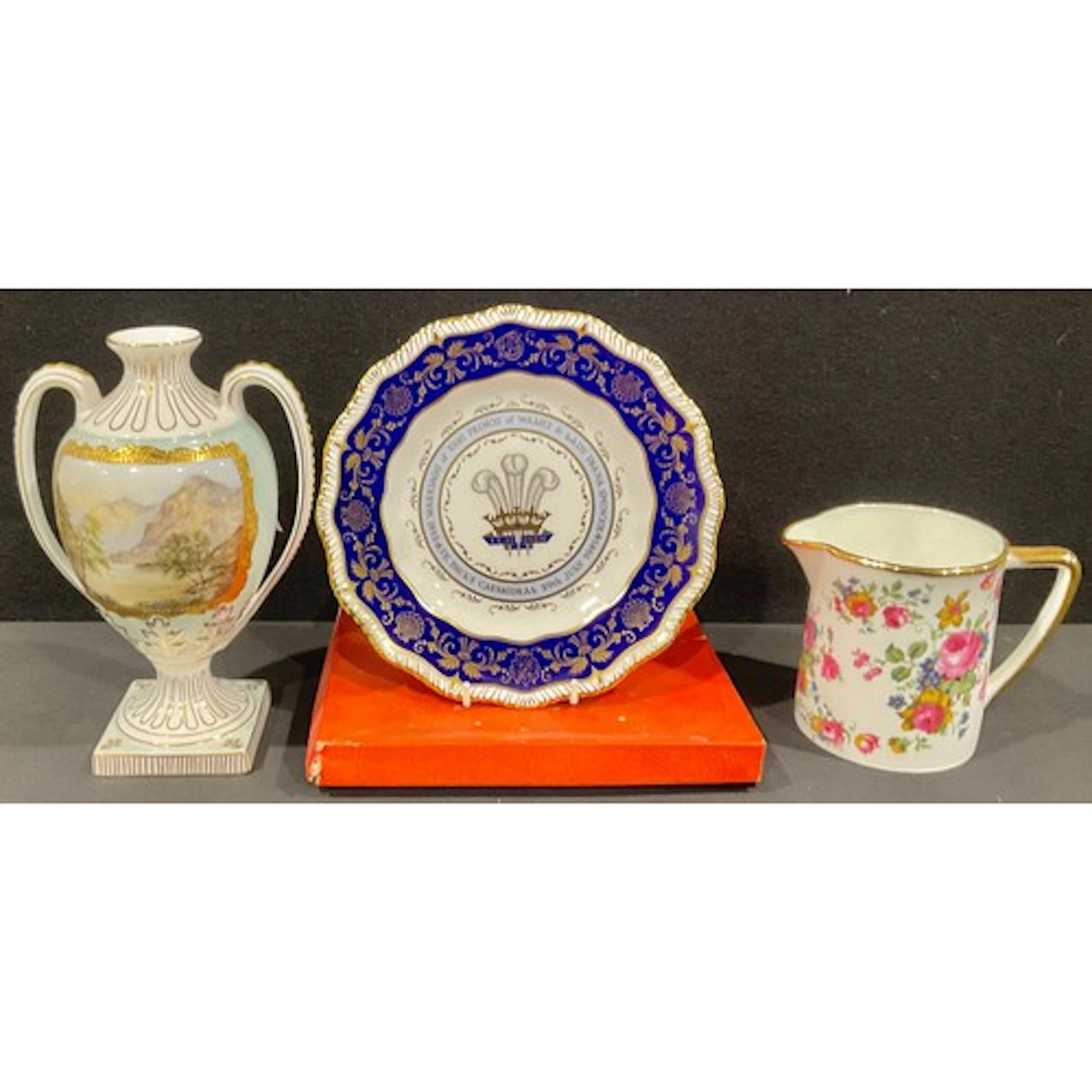 A Raymond Everill & Sons two handled porcelain vase, hand pa...