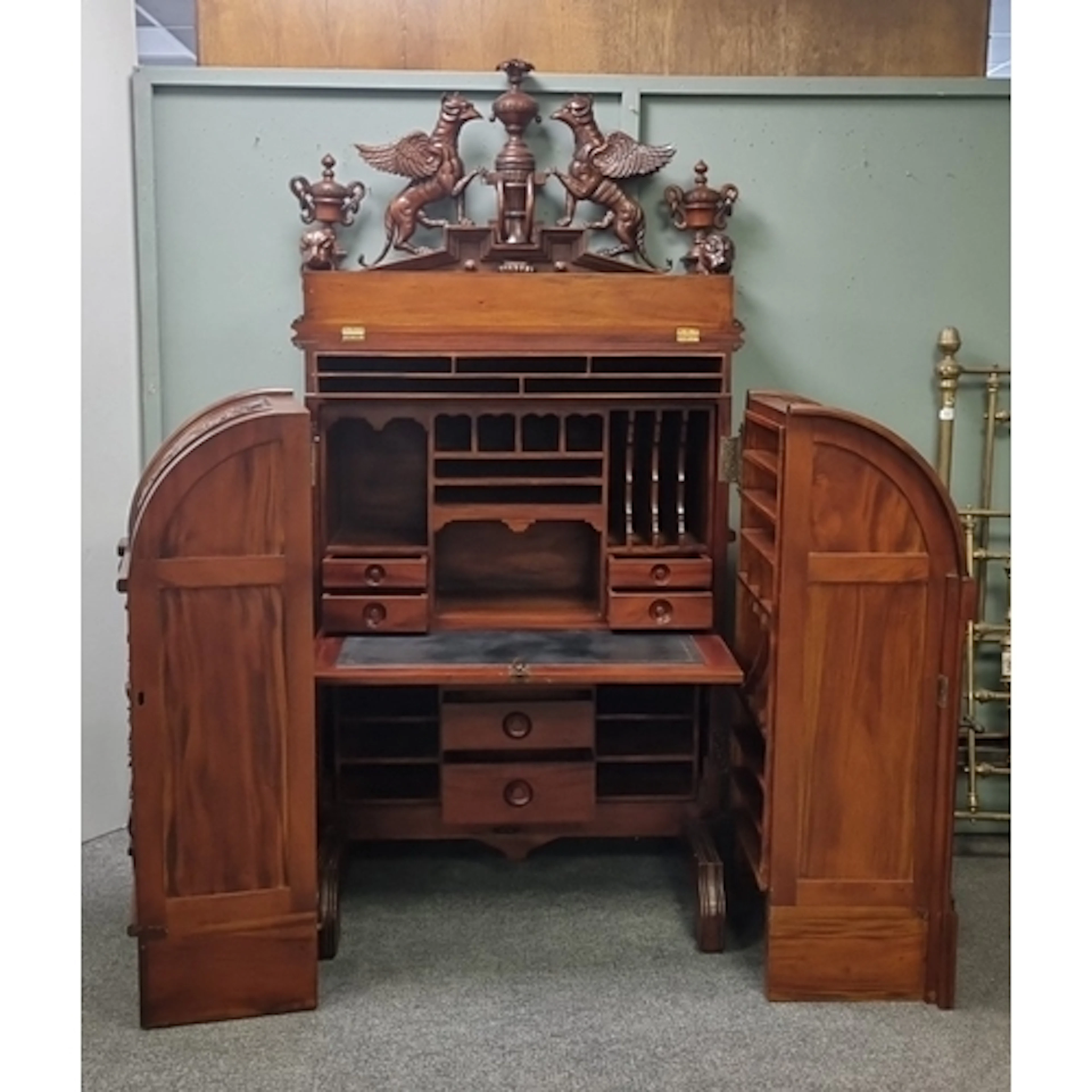 Elaborately carved Continental Secretaire Cabinet roll-top b...