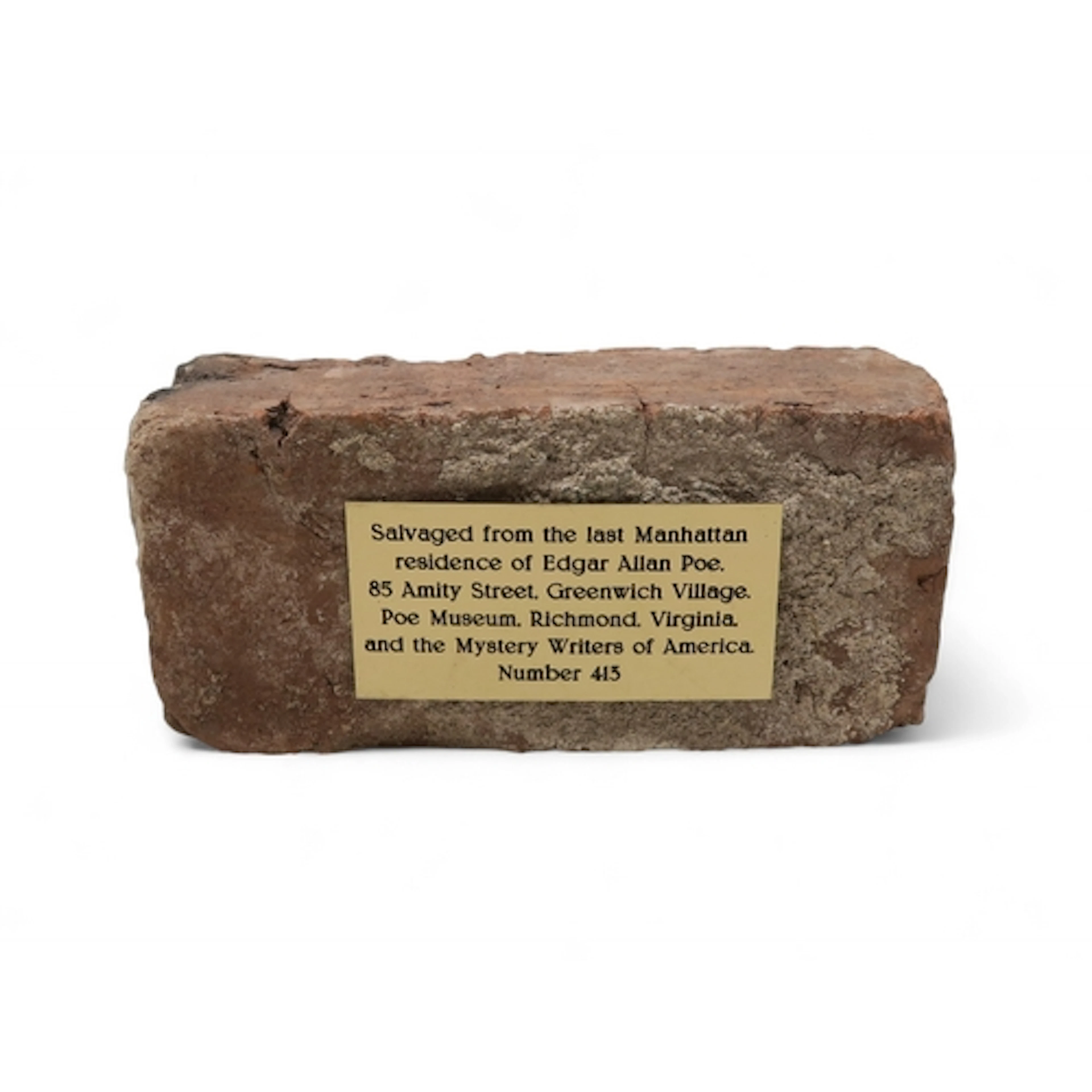 Edgar Allan Poe A brick, with plaque affixed reading "Salvag...