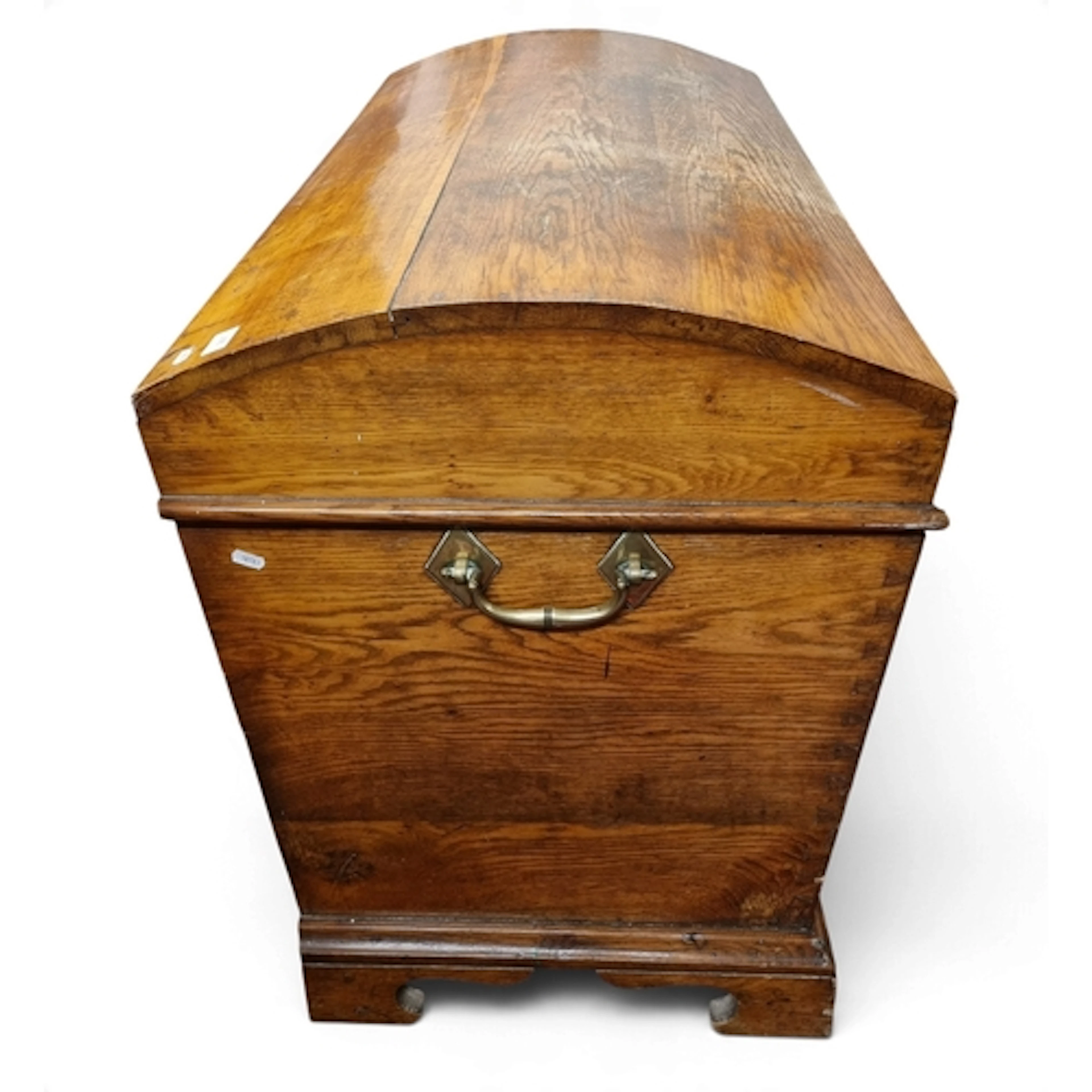 A 19th Century Oak domed Chest with large brass lifting hand...