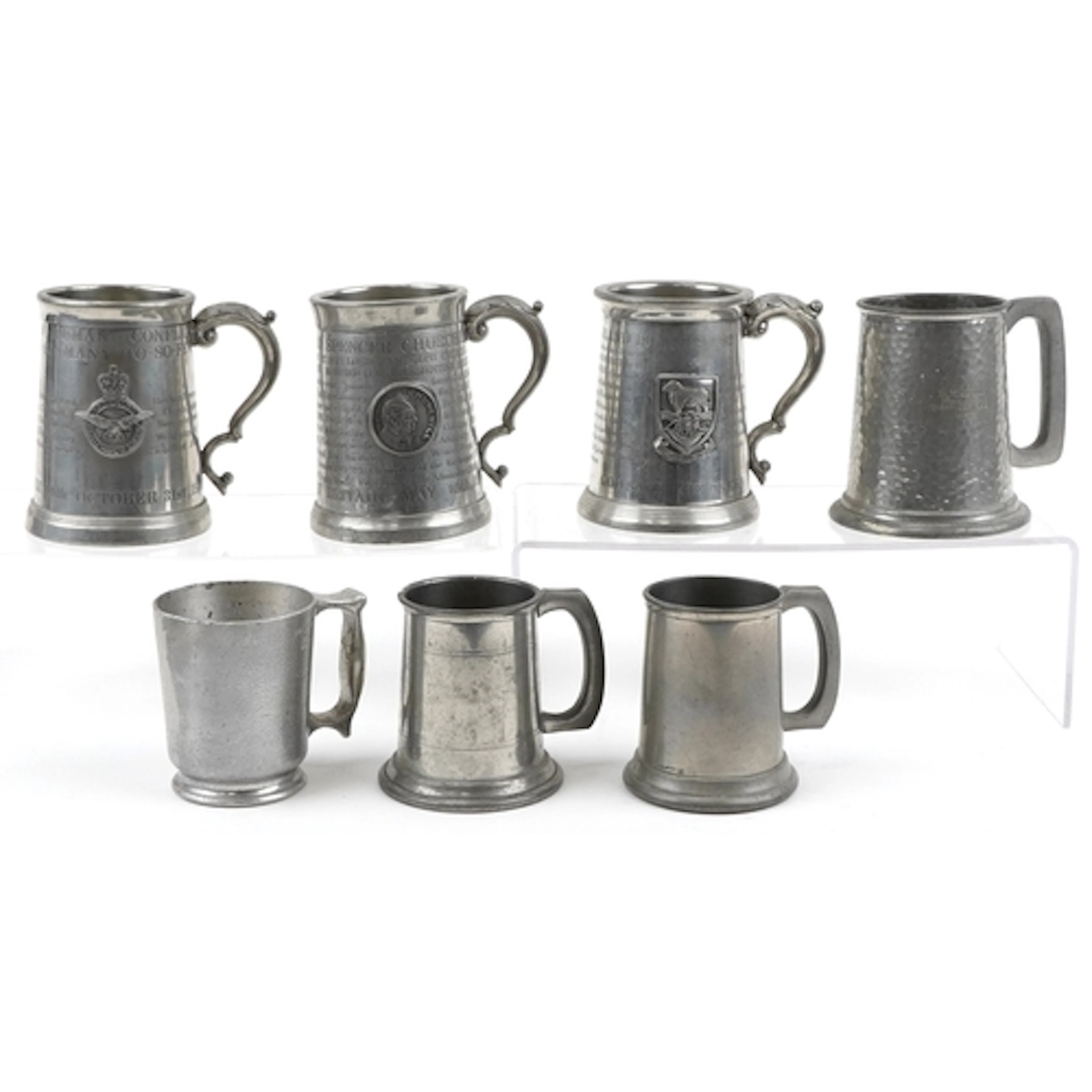Seven vintage pewter tankards including three commemorative ...