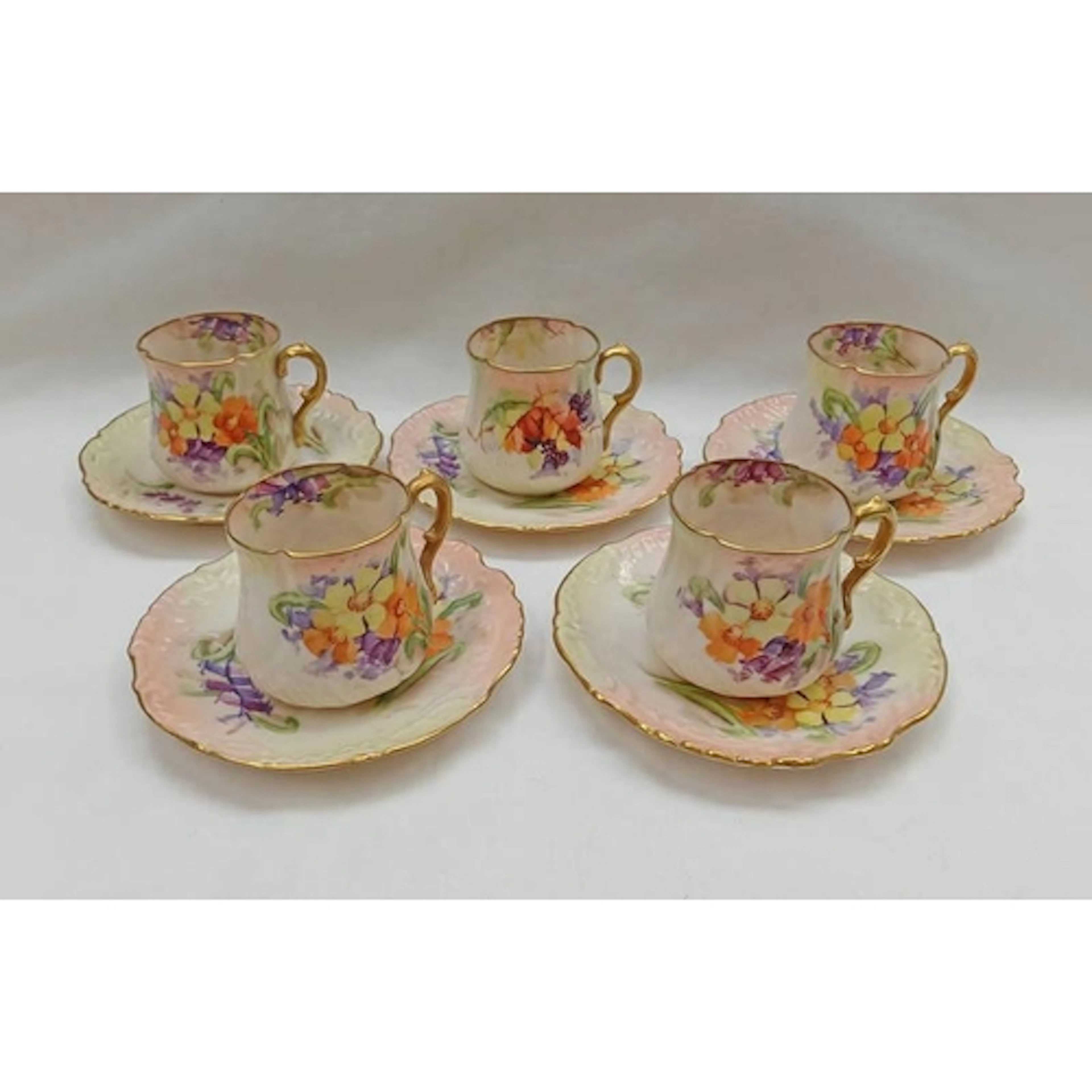 5 NAUTILUS PORCELAIN CUPS & SAUCERS WITH FLORAL DECORATION
