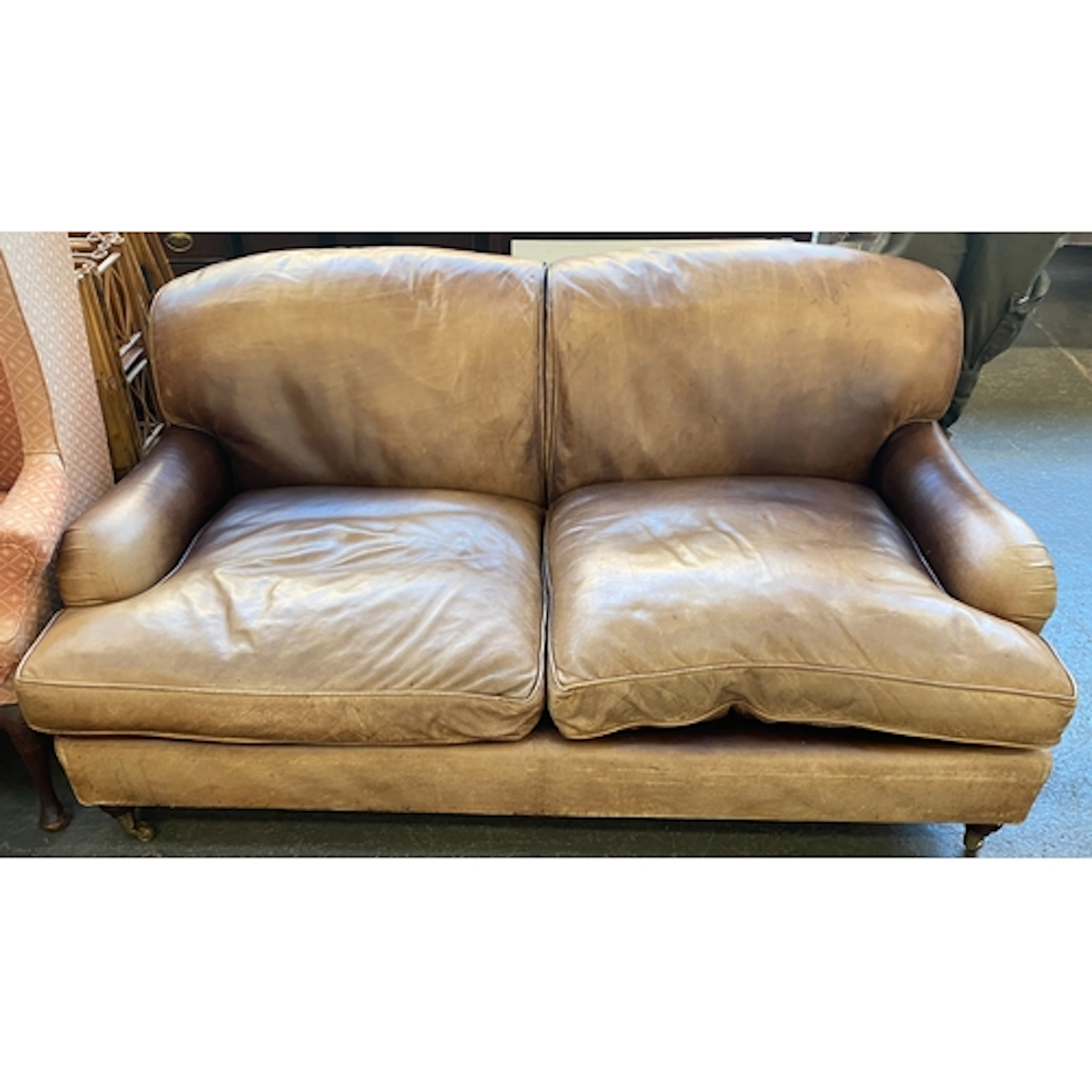 2 x A 20th century brown leather 2.5 seater sofa, the Lansdown p...
