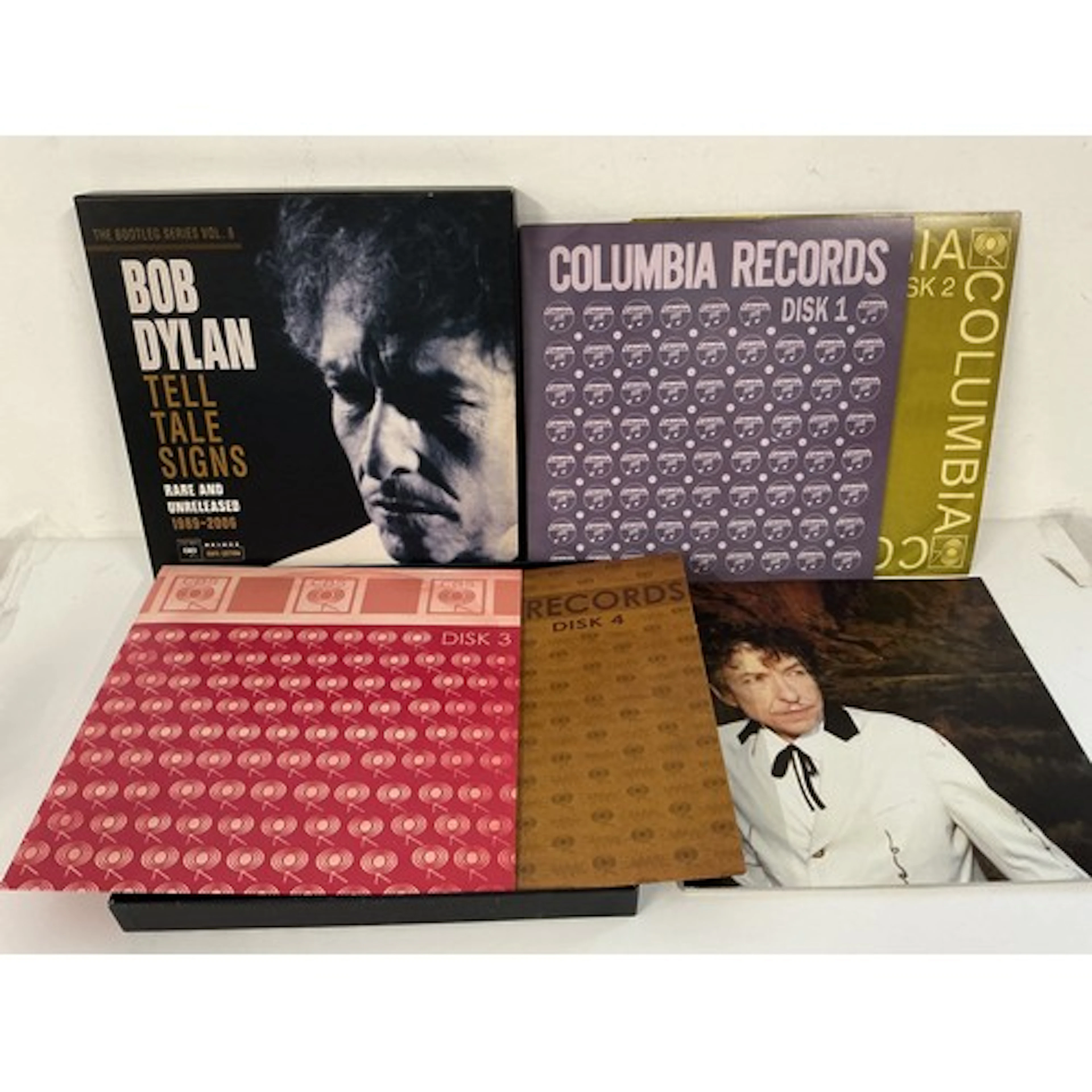 A Bob Dylan - Tell Tale Signs 4LP box set. Please note there...