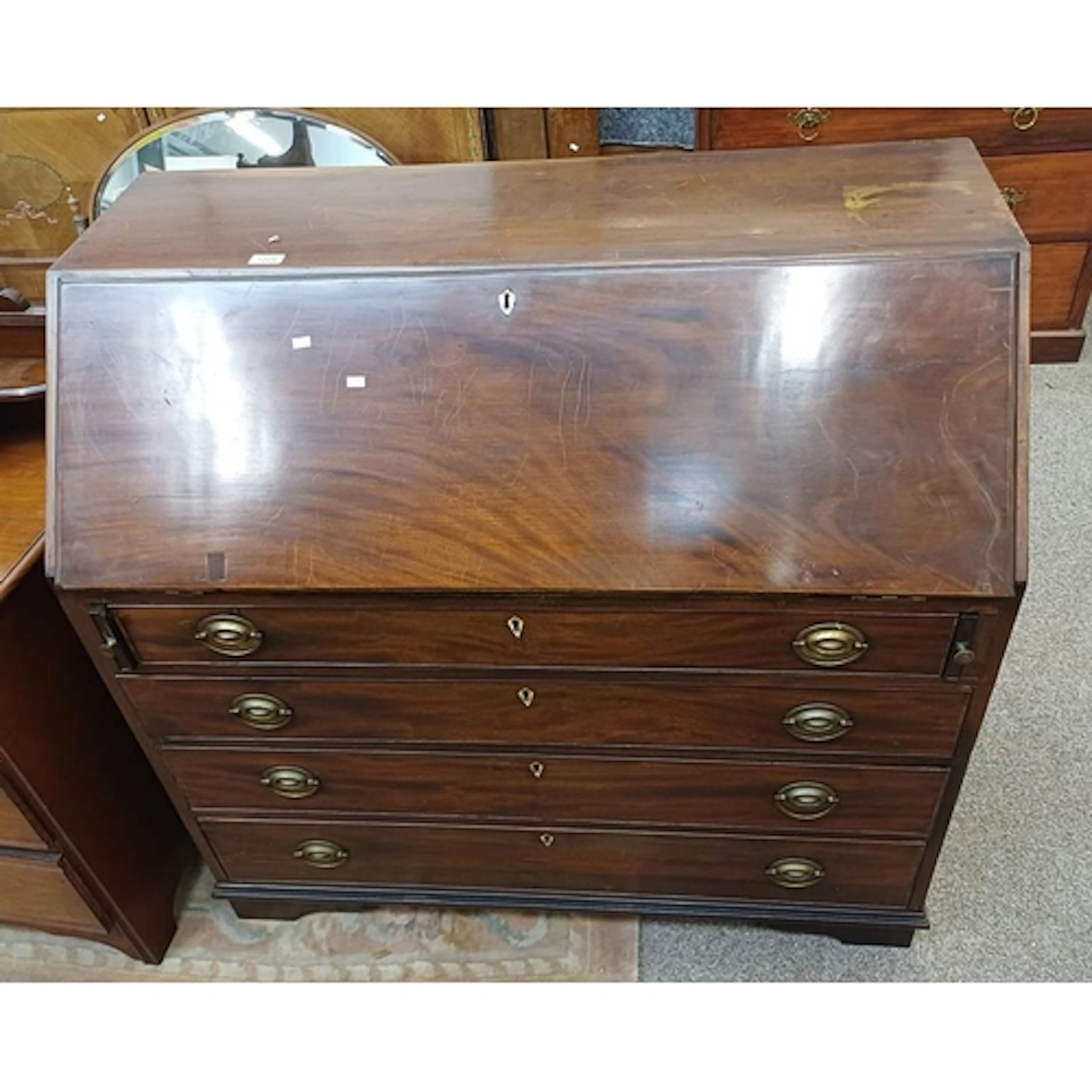 19TH CENTURY MAHOGANY BUREAU WITH FALL FRONT OVER 4 GRADUATE...