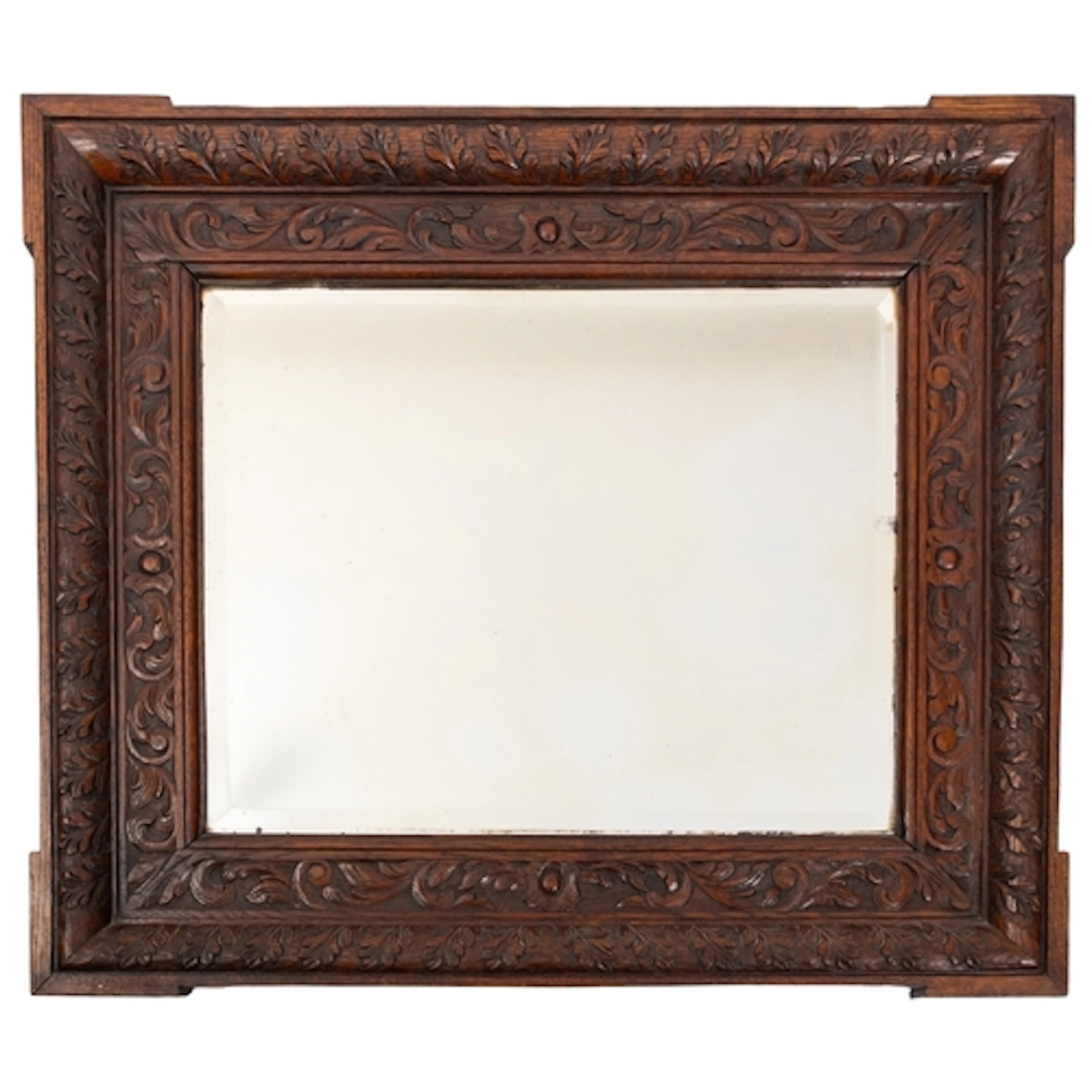 A carved and stained oak framed mirror in Dutch 17th Century...