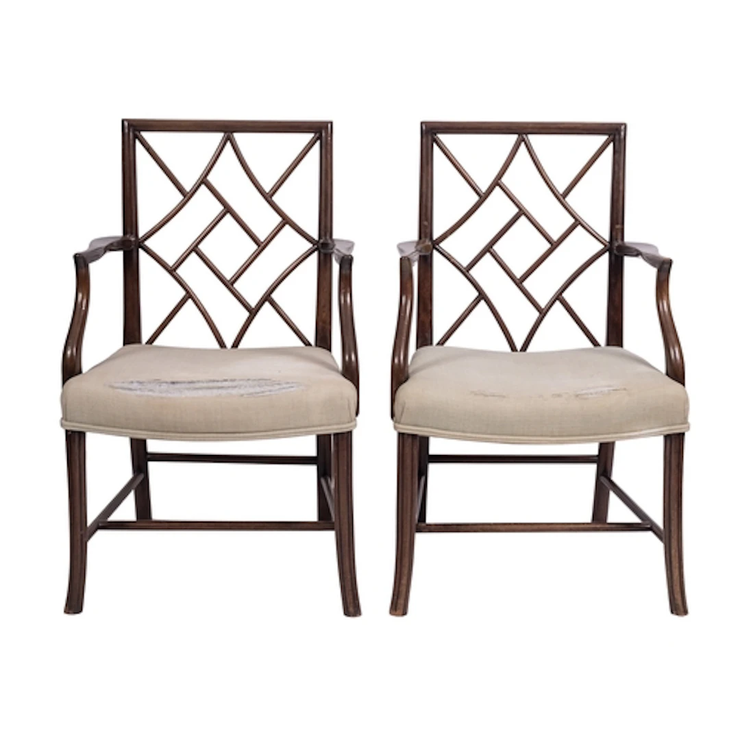 A pair of stained hardwood and upholstered elbow chairs in C...