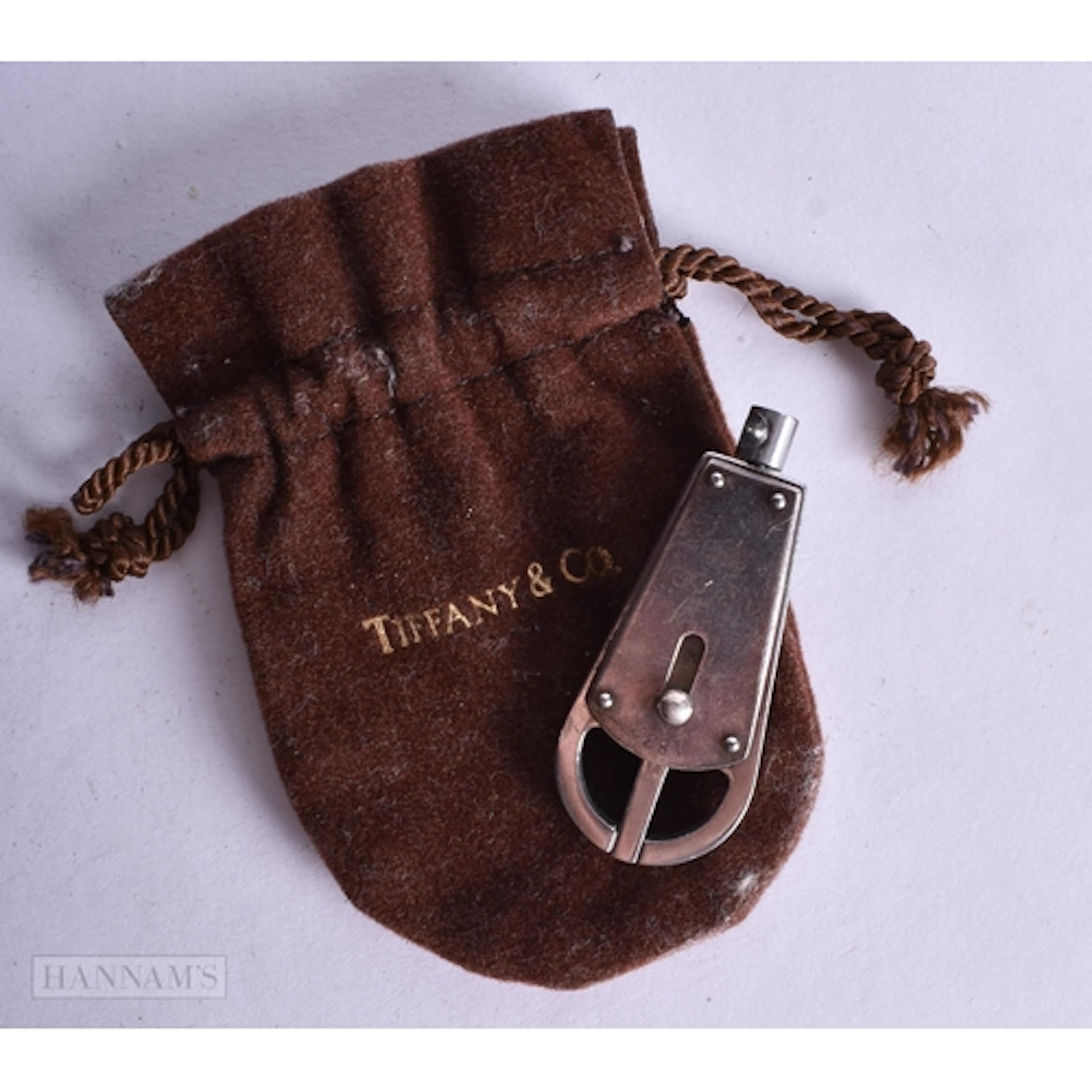 A Vintage Tiffany & Co Silver Valet Key Ring shaped like a N...