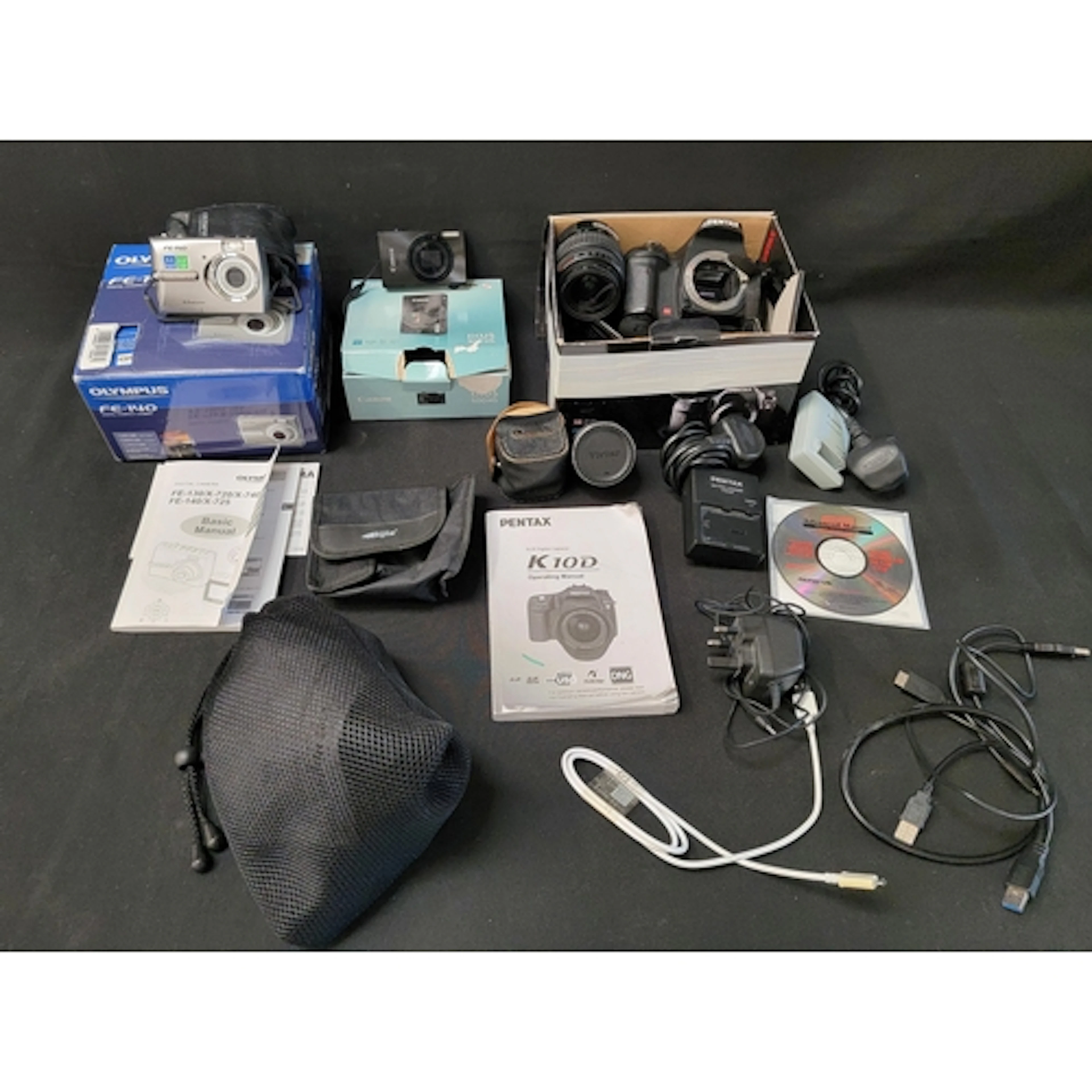 SELECTION OF DIGITAL CAMERAS comprising an Olympus FE-140 di...