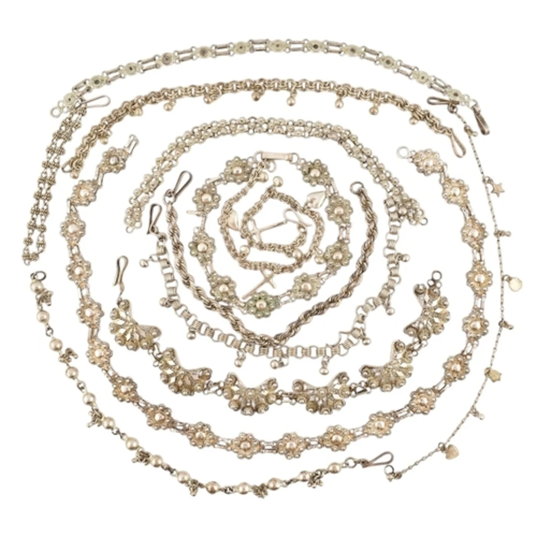 Collection of silver and white metal filigree bracelets and ...