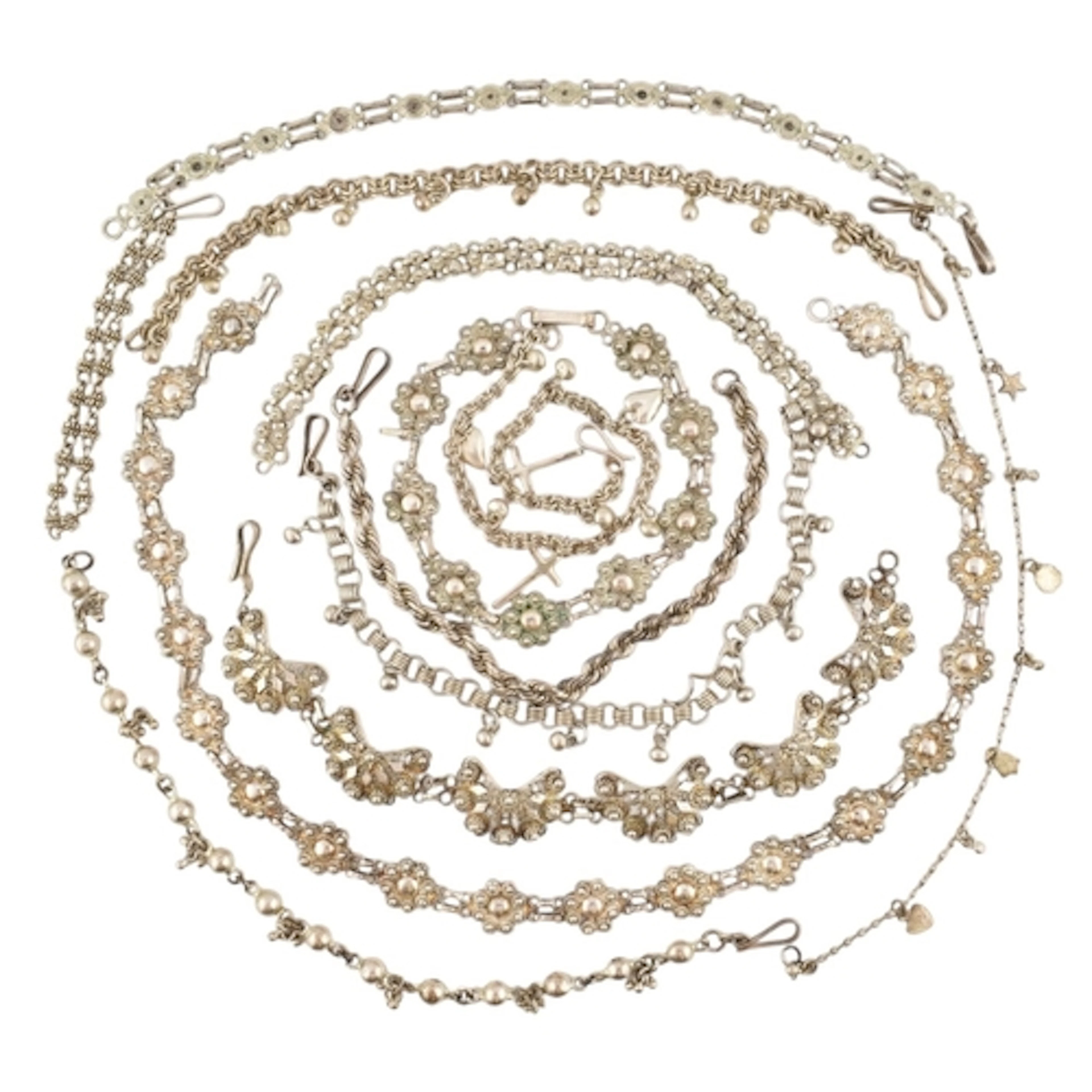 Collection of silver and white metal filigree bracelets and ...