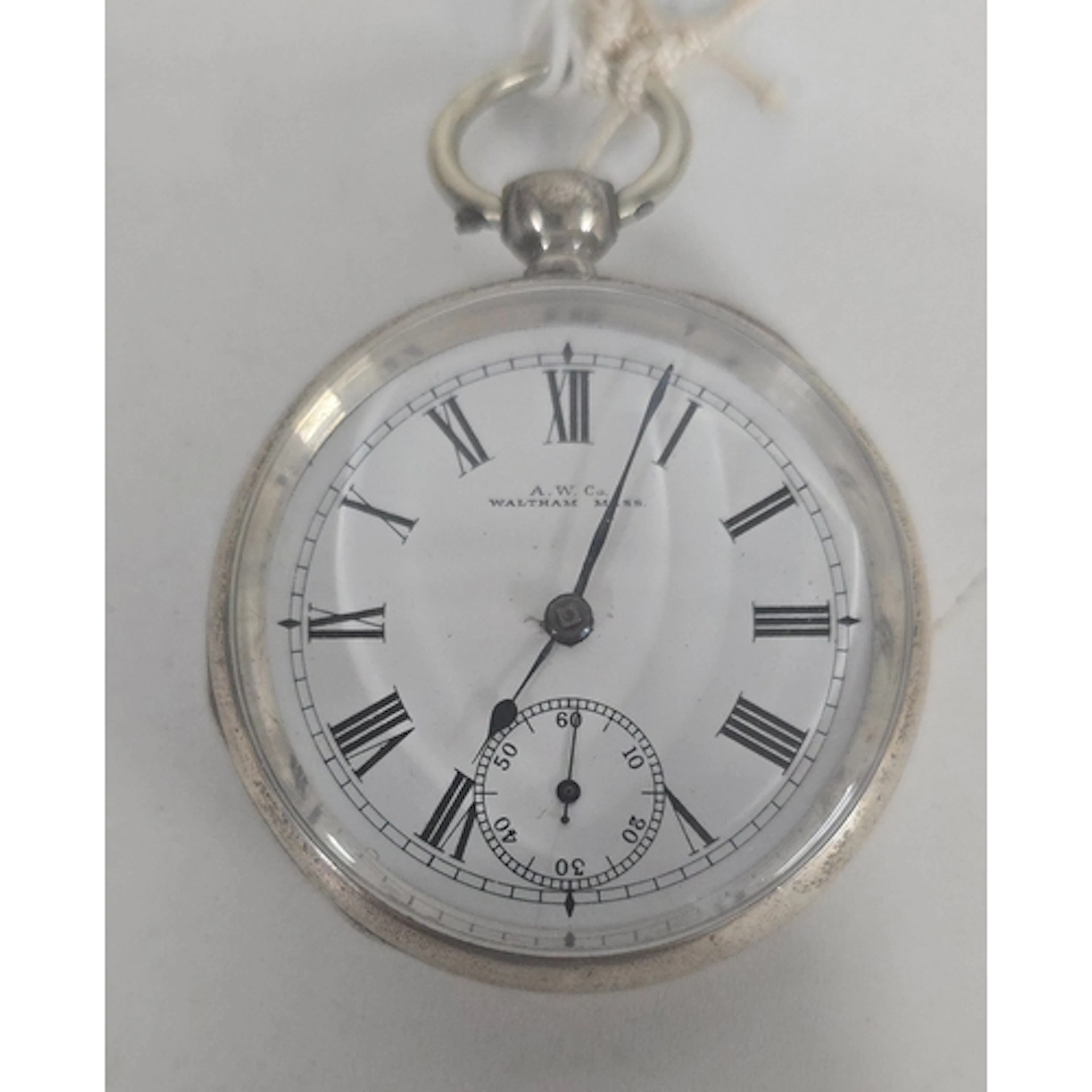 An American A.W.Co. Waltham key-wind pocket watch, with Engl...